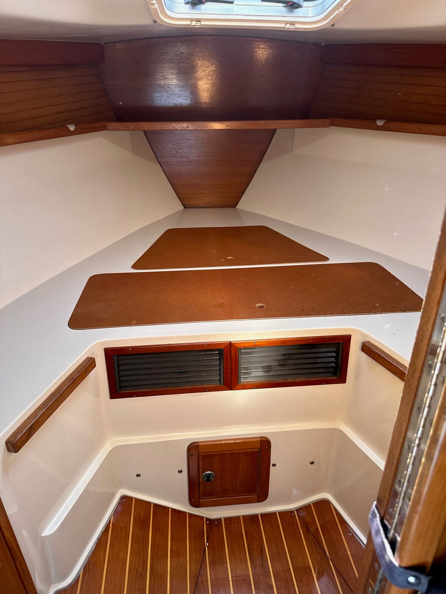 Interior of a 2001 Catalina MkII with wood paneling and a skylight.