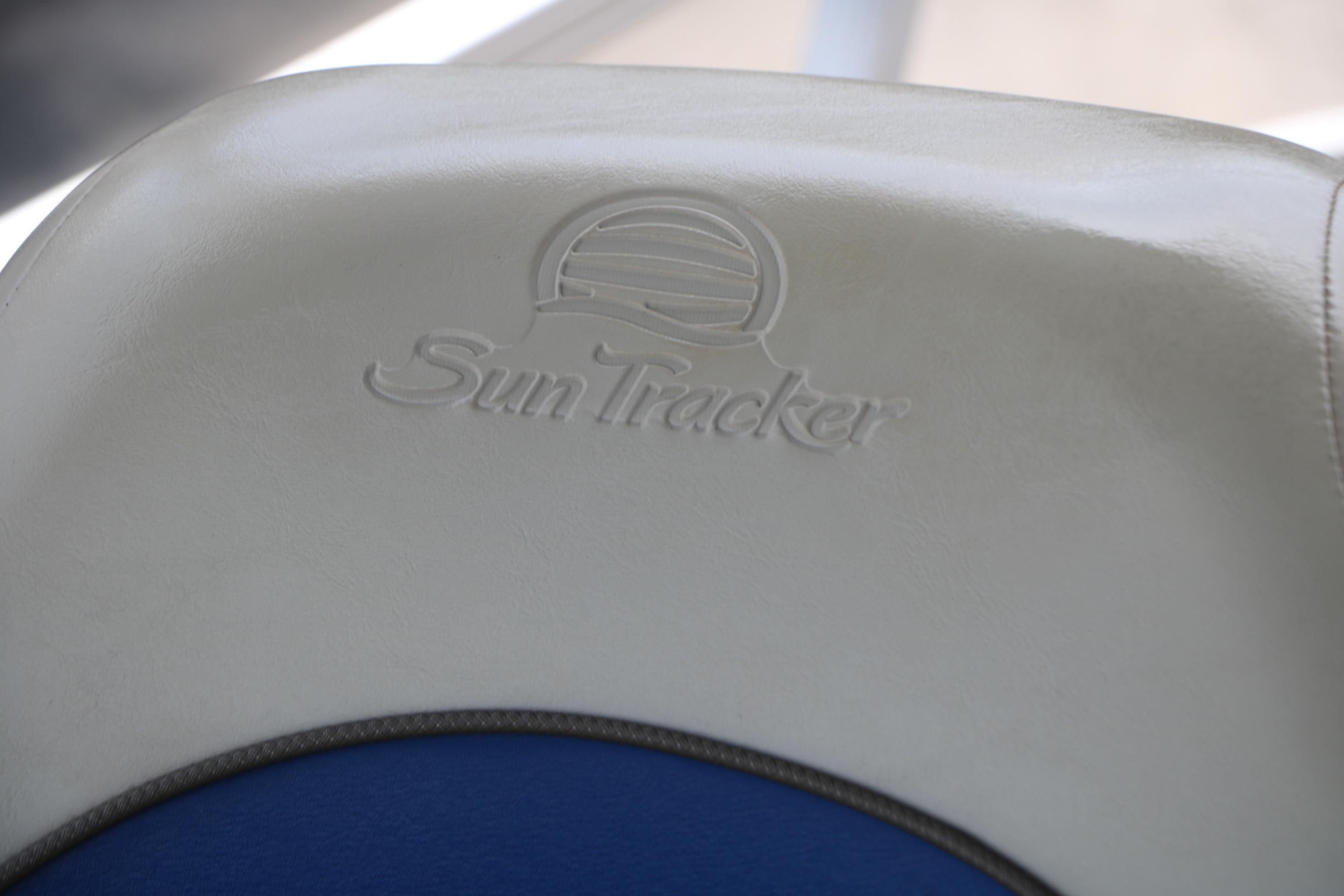 Sun Tracker Fishin' Barge 20 DLX 2013 seat with embossed logo detail.
