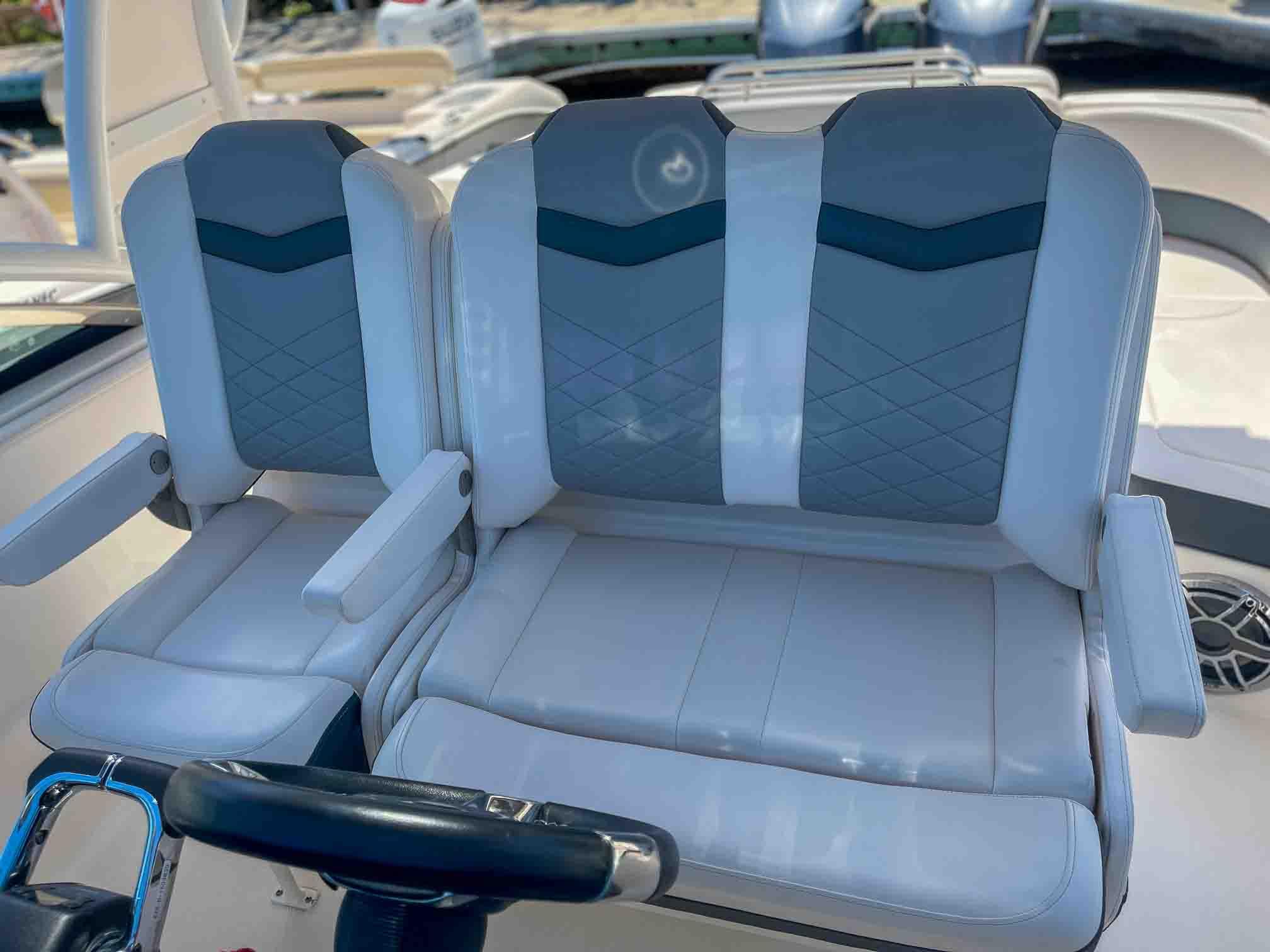2021 Chaparral 300 OSX boat seats, featuring modern design and comfortable upholstery.