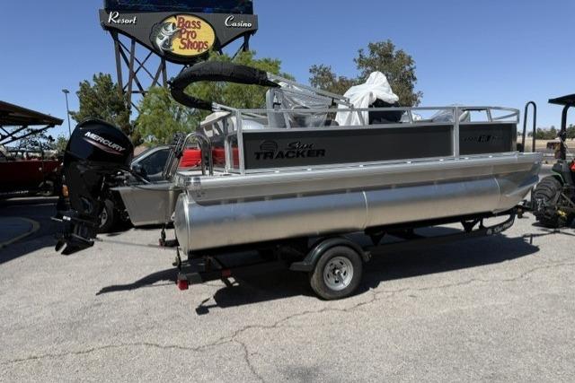 2026 Sun Tracker Bass Buggy 16 XL Select pontoon boat on trailer at Bass Pro Shops.