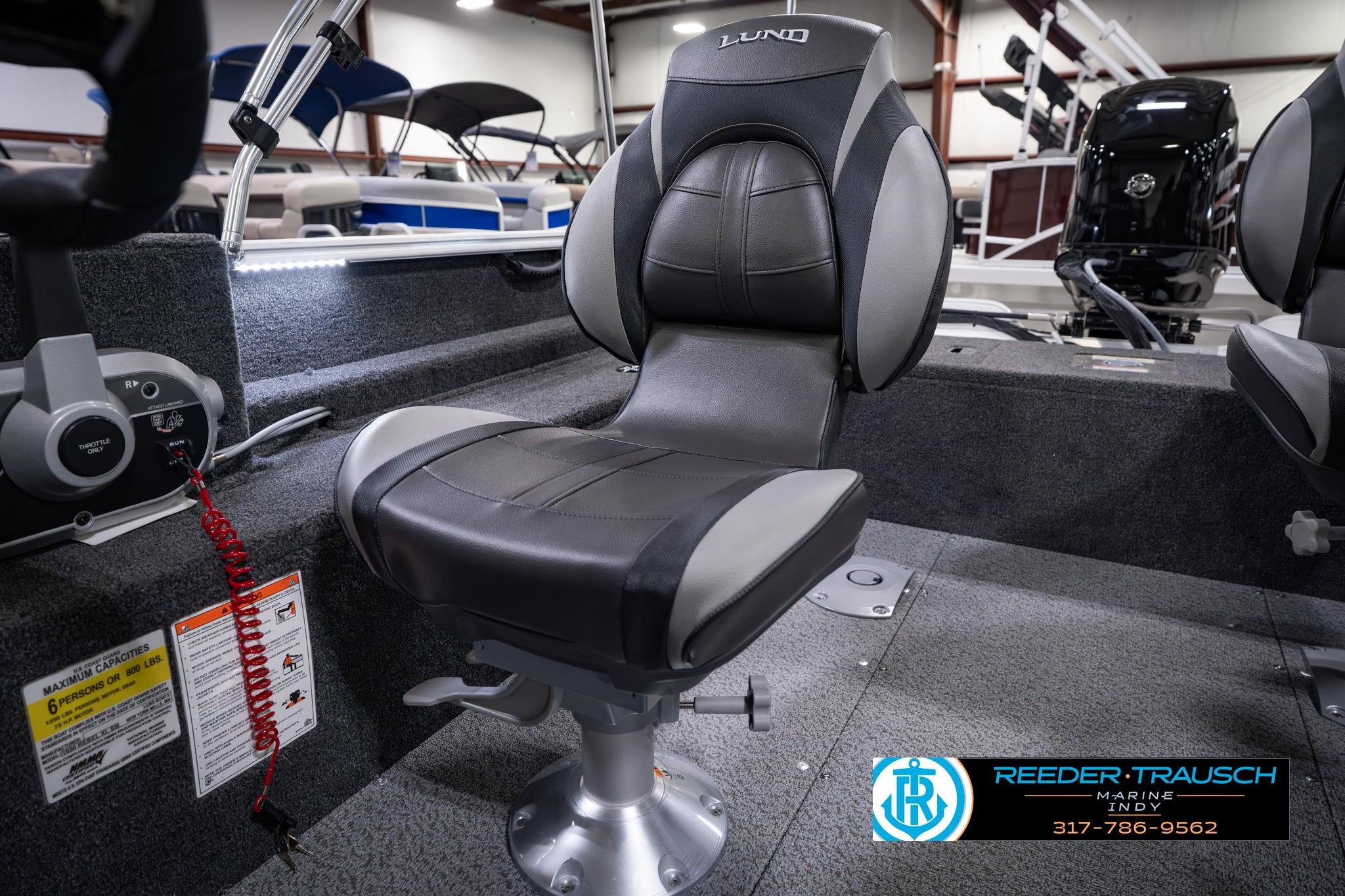 2026 Lund 1650 Rebel XL SS boat interior with comfortable seating and control panel.