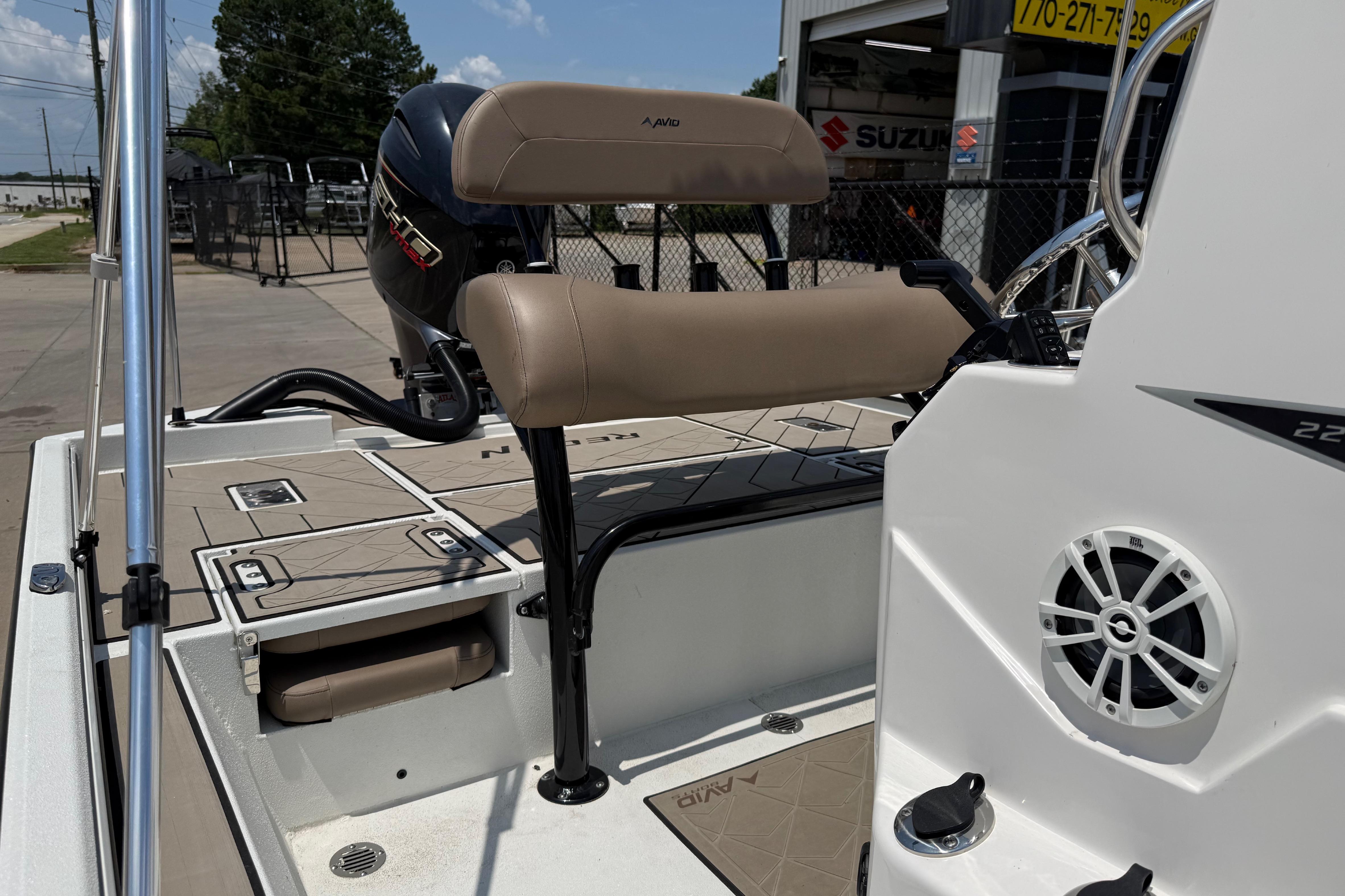 2025 Avid 22 Recon boat interior with seating and speaker system.