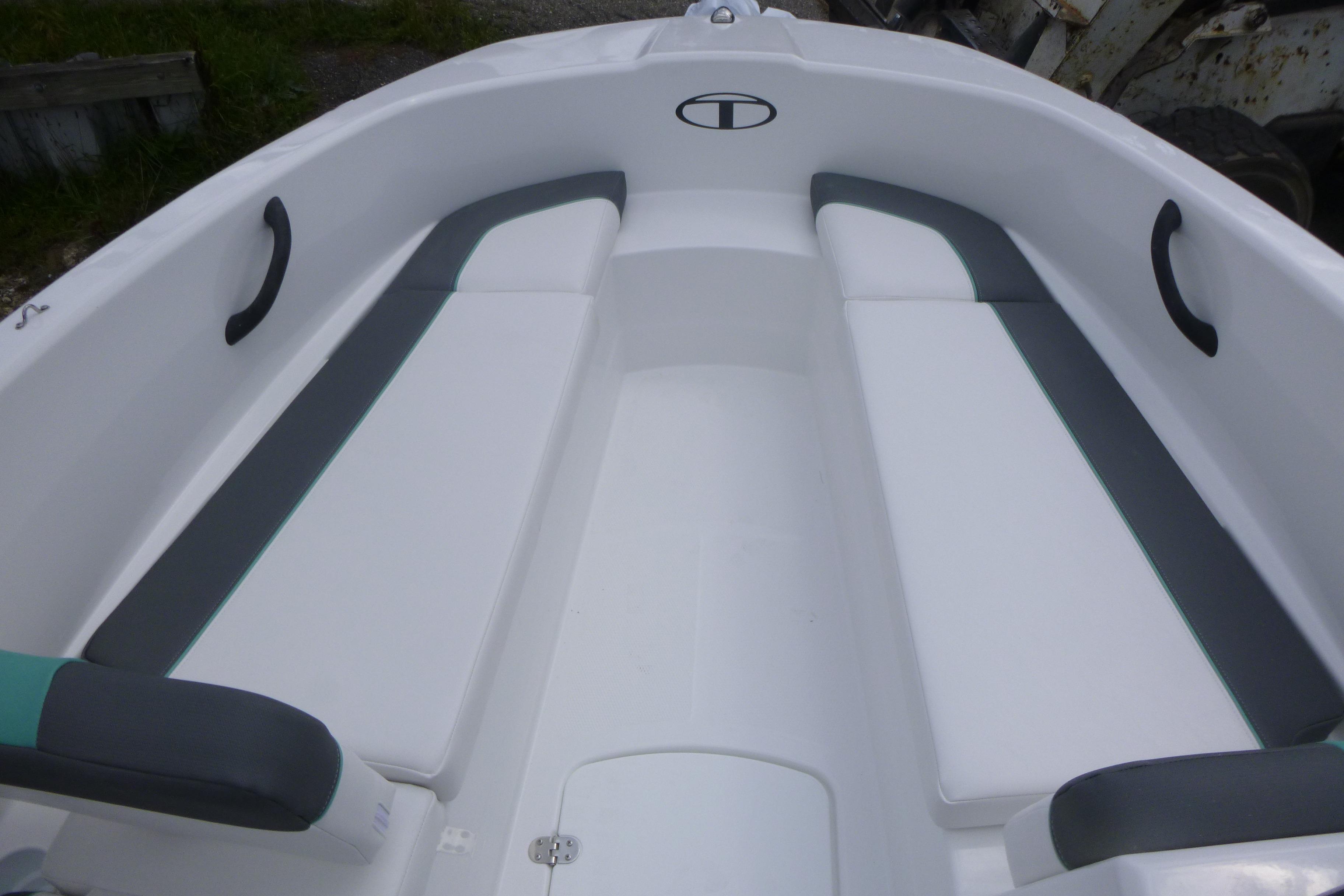 2026 Tahoe T16 boat interior with white and gray seating.