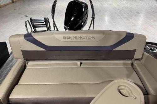 2026 Bennington 22SXSB boat interior with seating and motor view.