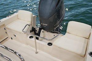 2026 Grady-White Fisherman 180 boat interior with seating and outboard motor on water.