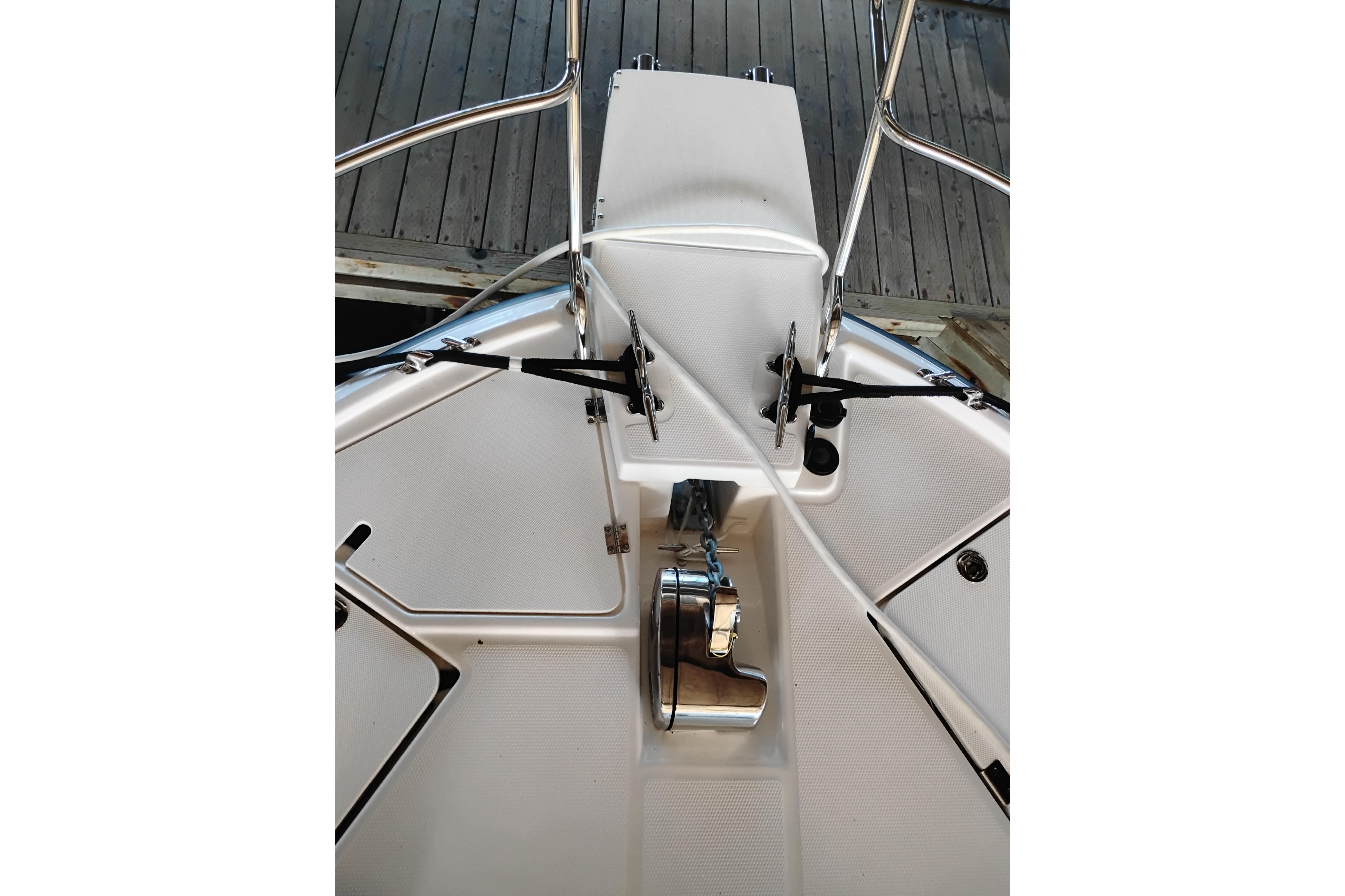 2022 Cutwater C-32 Coupe boat deck with anchor and railing details.