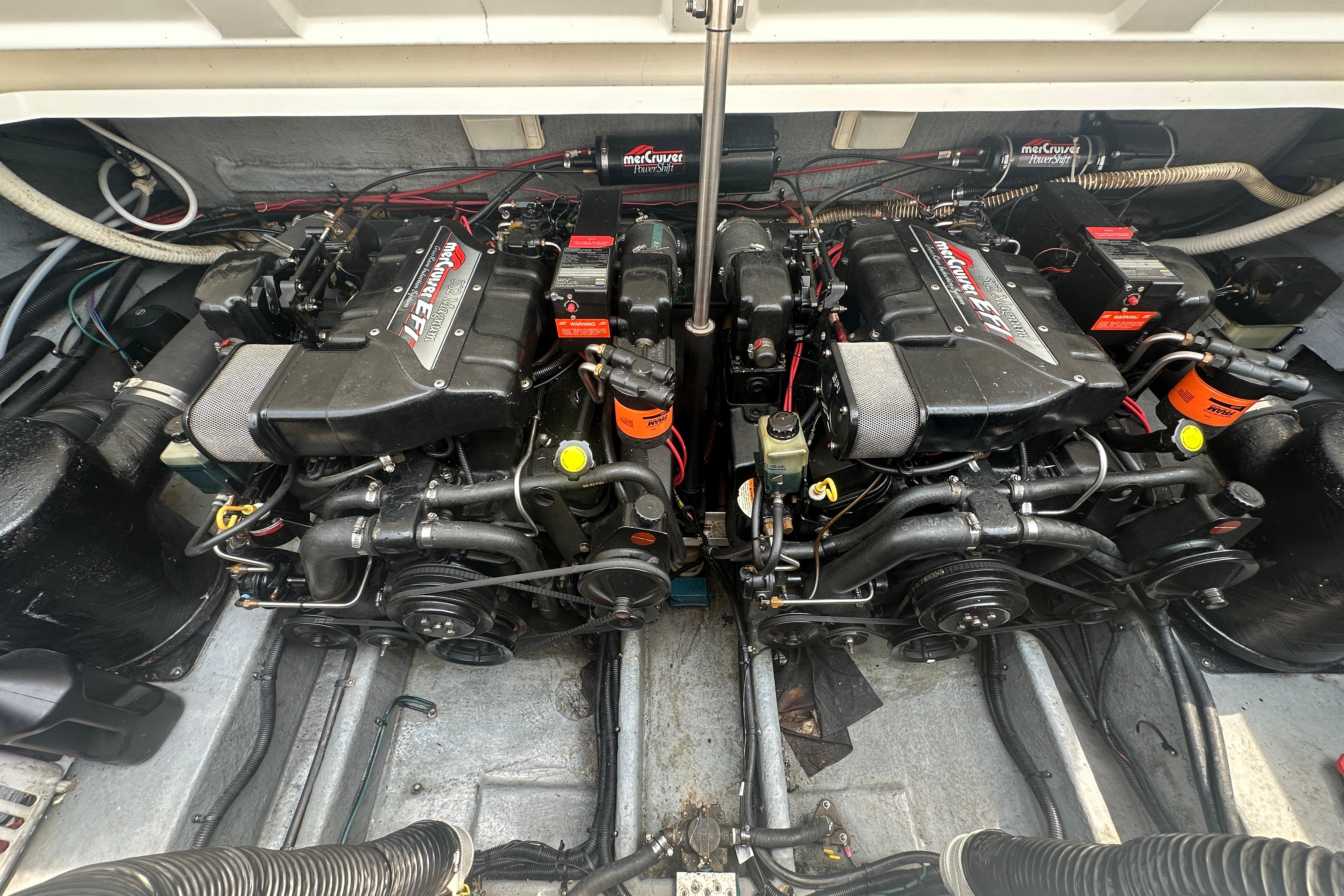Engine compartment of a 1995 Sea Ray 380 Sun Sport with twin MerCruiser engines.