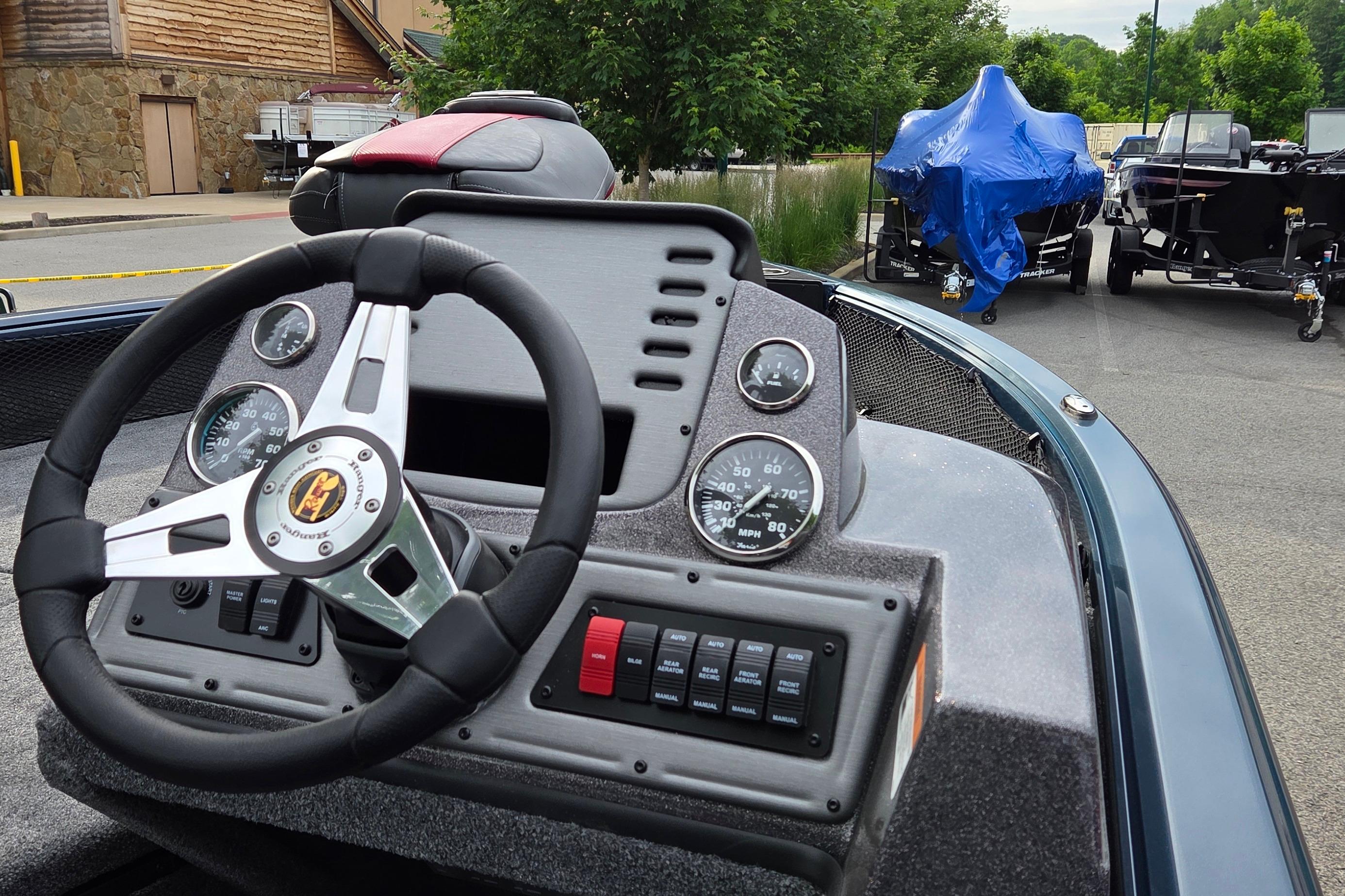 2026 Ranger VS1782SC Reata boat dashboard with steering wheel and gauges.