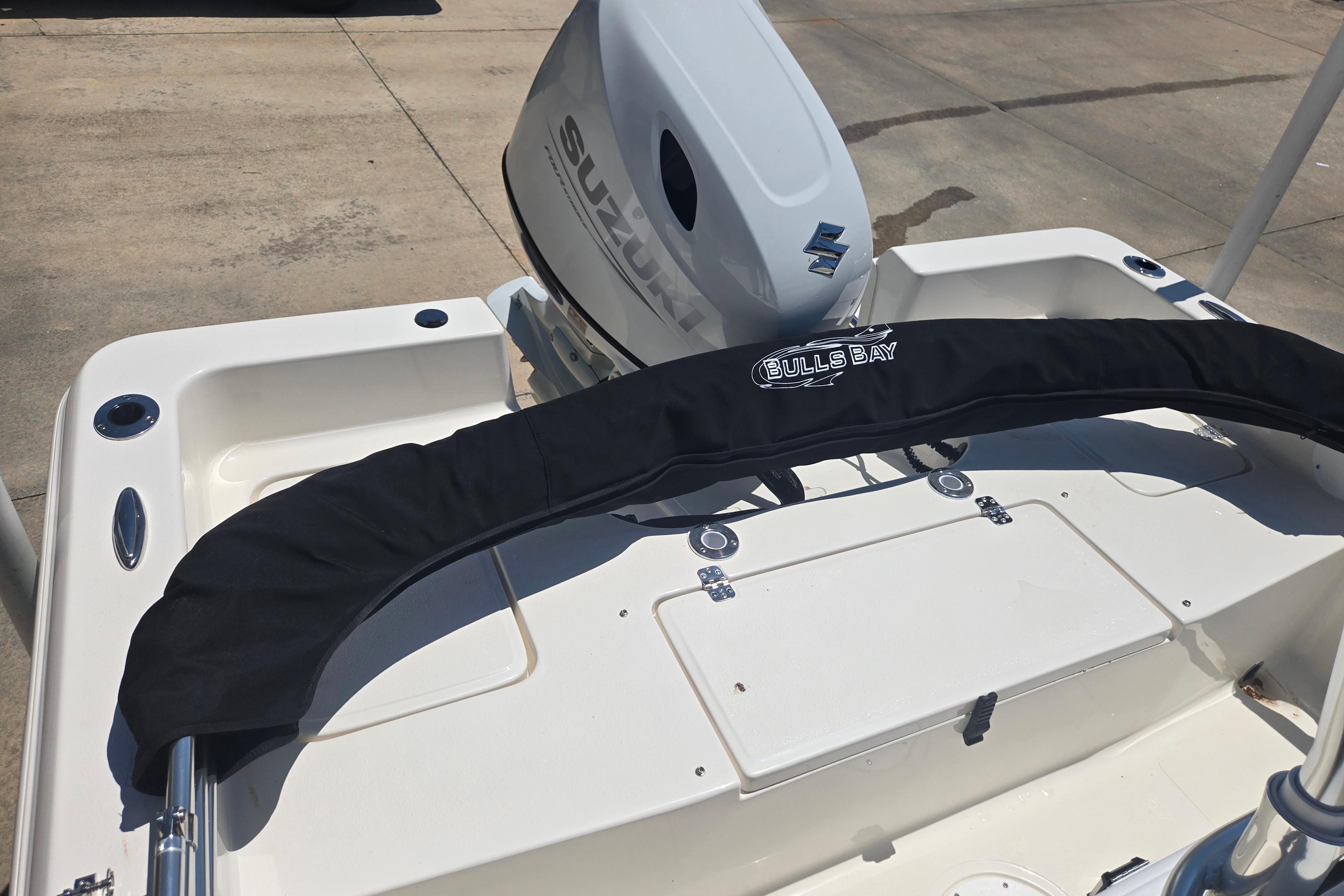 2026 Bulls Bay 2000 boat with Suzuki outboard motor, rear deck view.