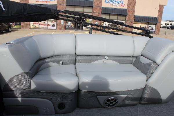 2025 Regency 230 DL3 boat interior with gray cushioned seating.