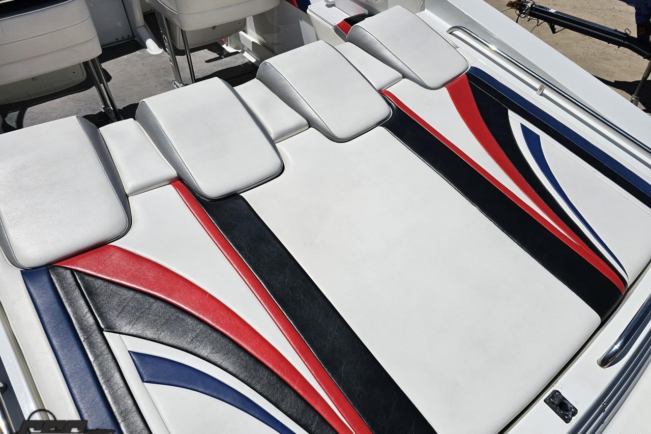 2005 Formula 271 FASTech boat interior with red, white, and blue upholstery design.