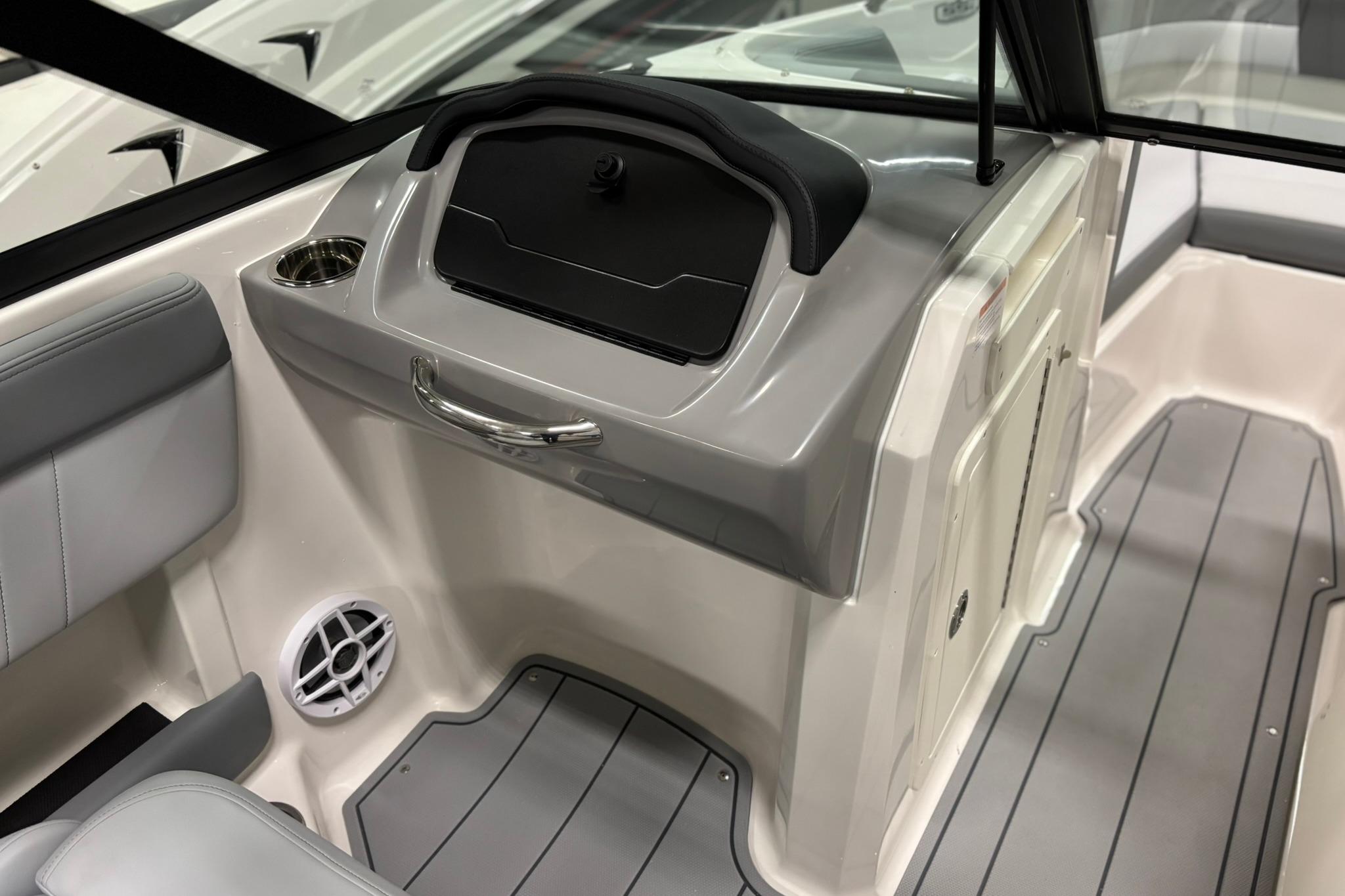 Interior of 2026 Chaparral 21 SSi OB boat, featuring sleek seating and modern design.