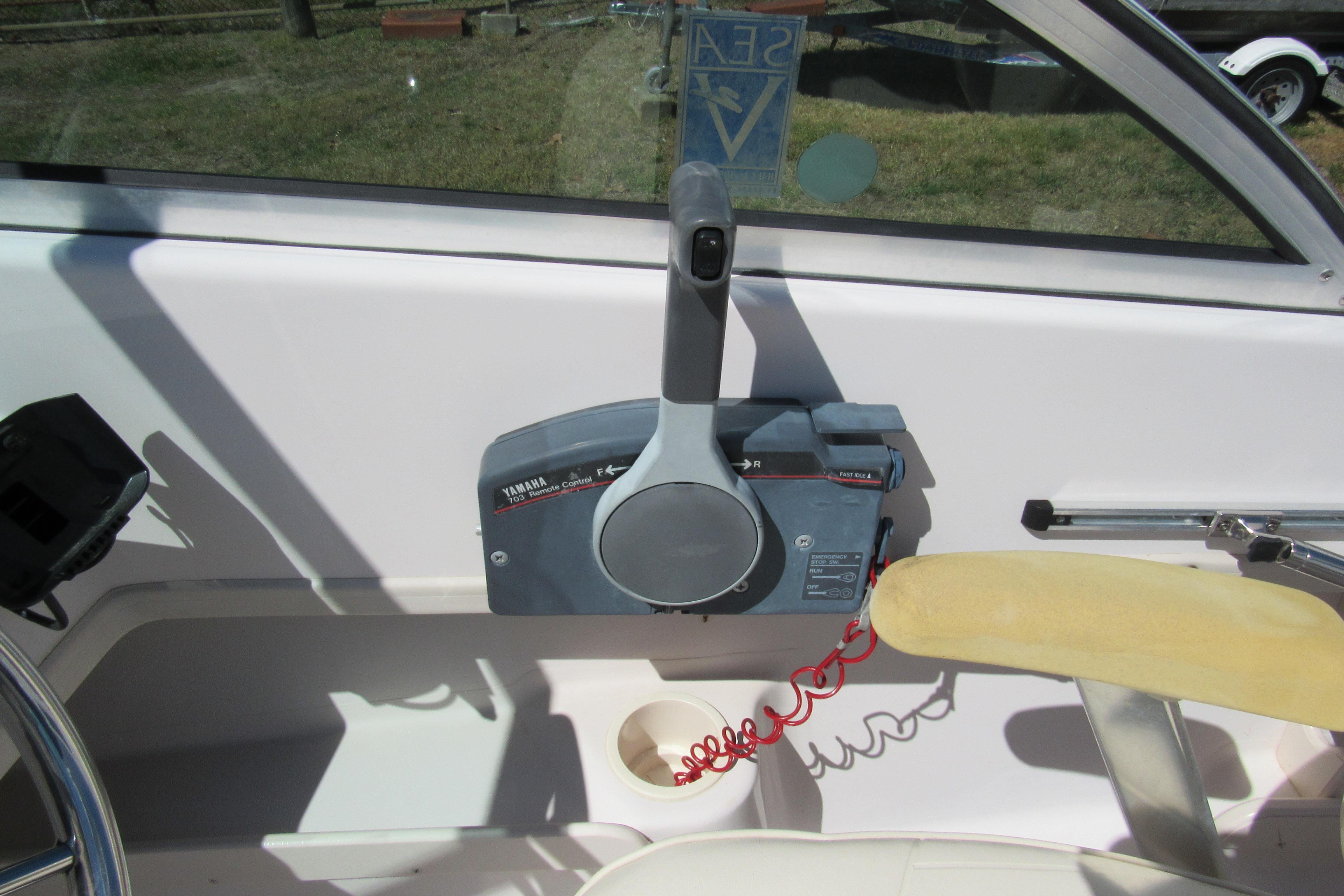 Control panel of a 2003 Grady-White Freedom 192 boat with Yamaha throttle.
