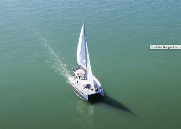 Aerial view of a 2021 Bali 4.8 sailboat cruising on calm waters.