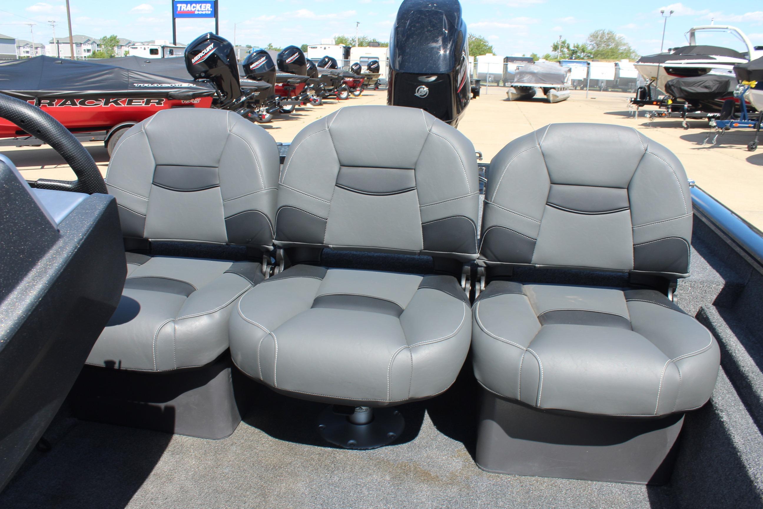 2026 Tracker Pro Team 175 Crappie Edition boat seats in showroom display.