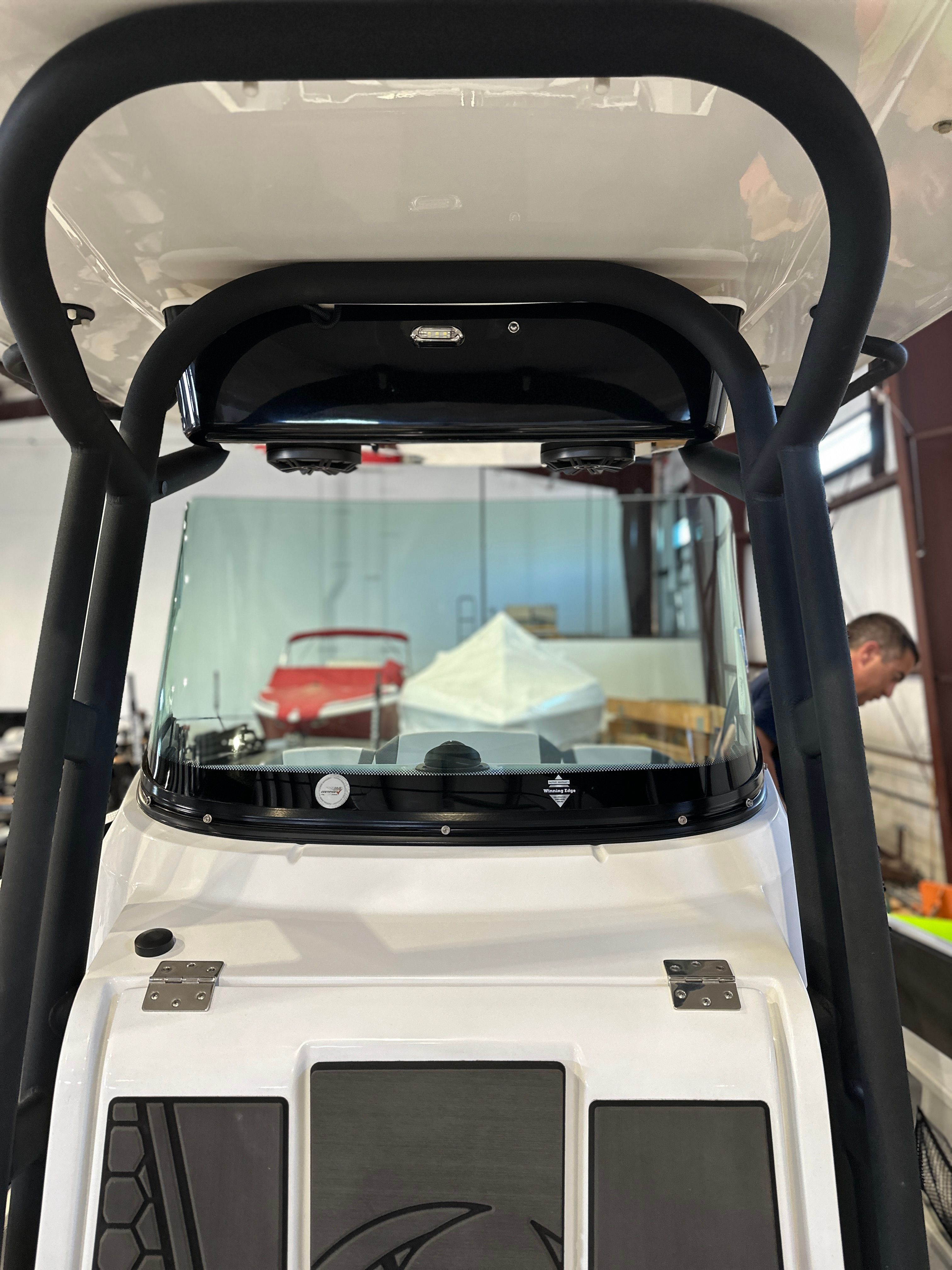 The image shows the cockpit of a 2021 Scarab 255 Open ID boat.