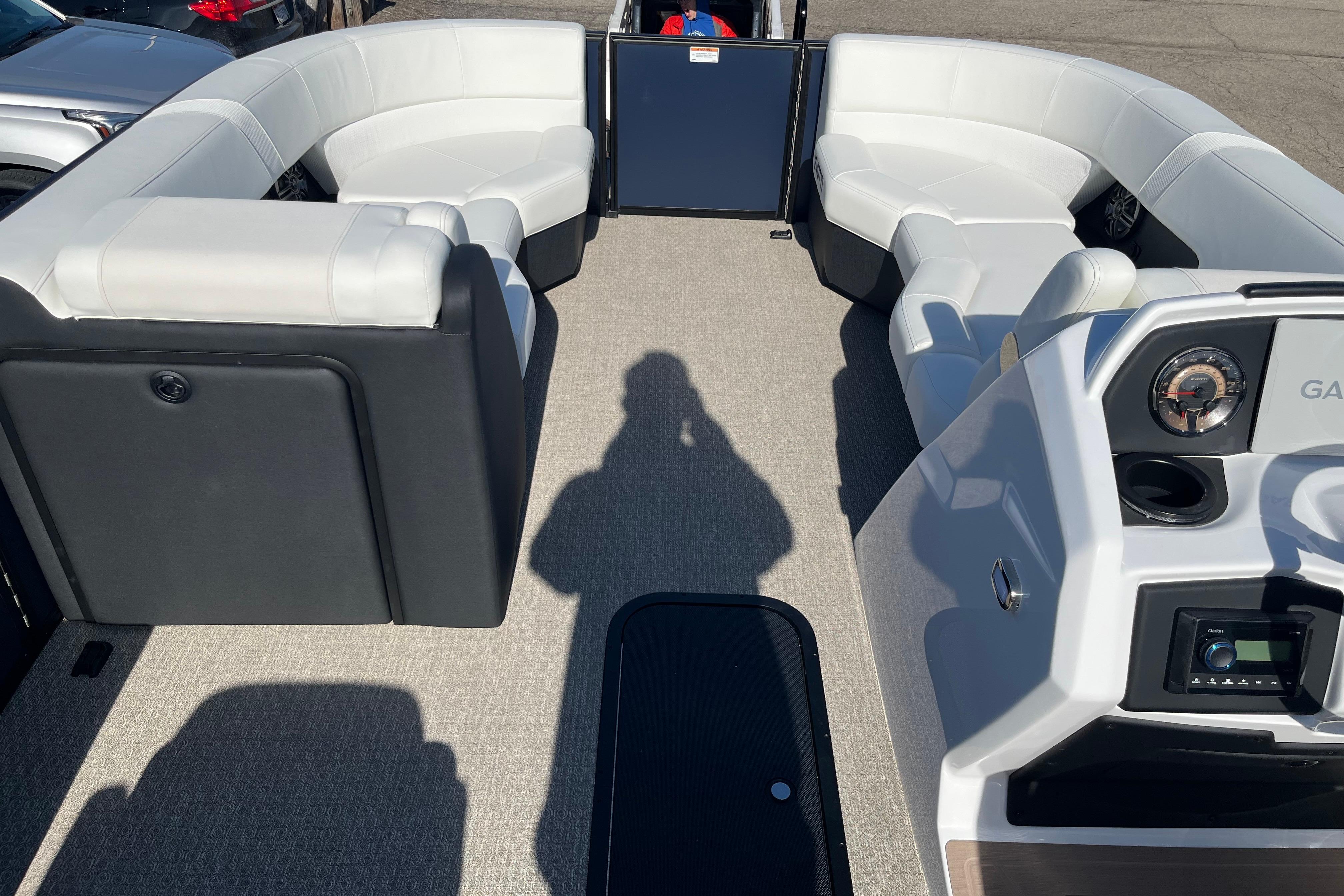 Luxurious 2026 Evotti 523CS boat interior with plush seating and modern dashboard.