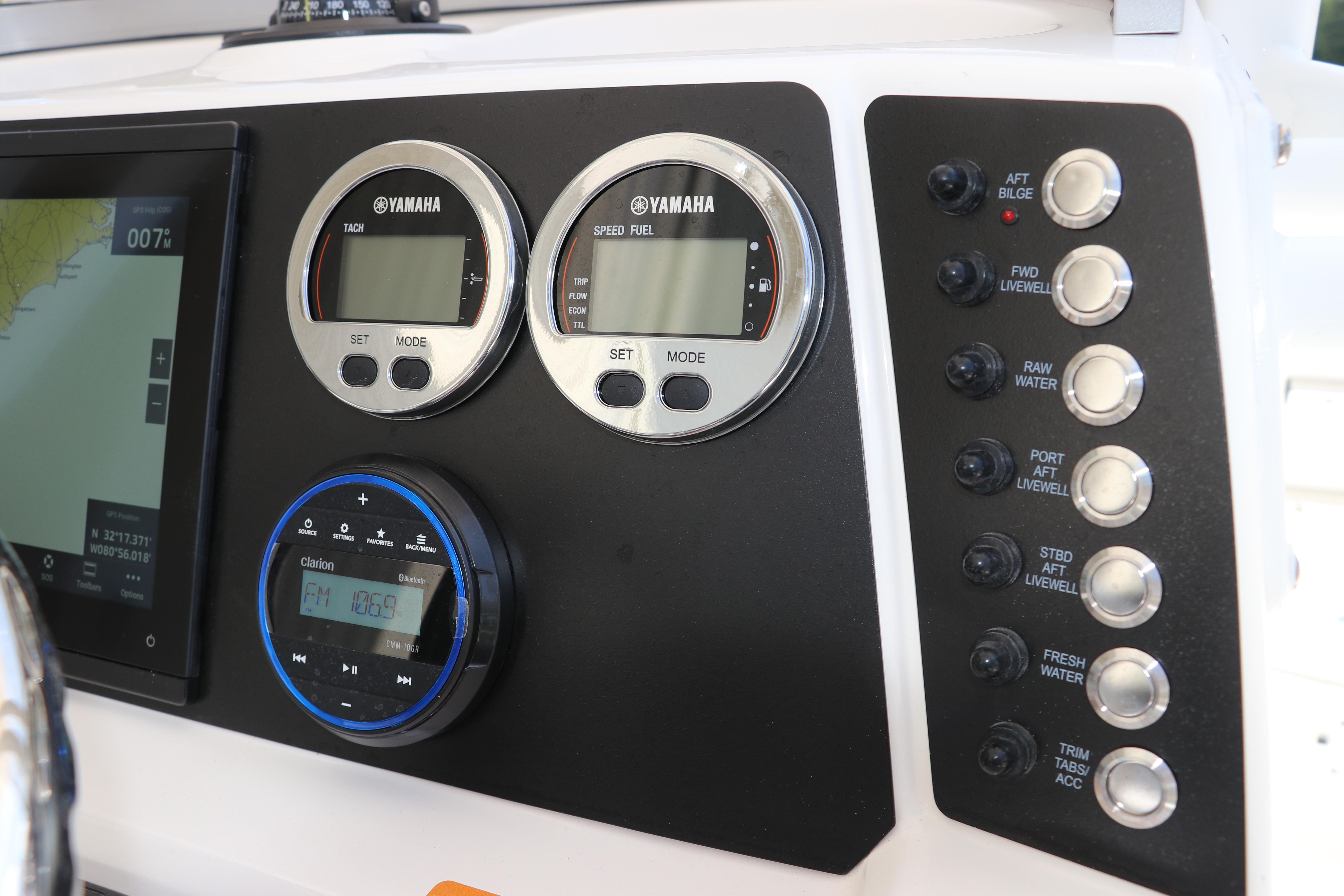 Dashboard of 2026 Robalo 226 Cayman boat with Yamaha gauges and control panel.