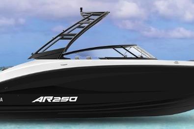 2026 Yamaha Boats AR250 on clear water with sleek black and white design.