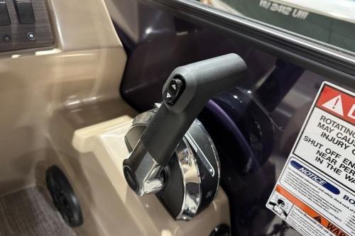 Close-up of 2026 Bennington 22SXSB boat throttle control with safety warnings.