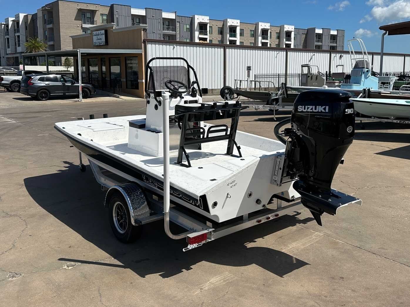2026 Freedom Boats EAGLE with Suzuki engine on trailer.