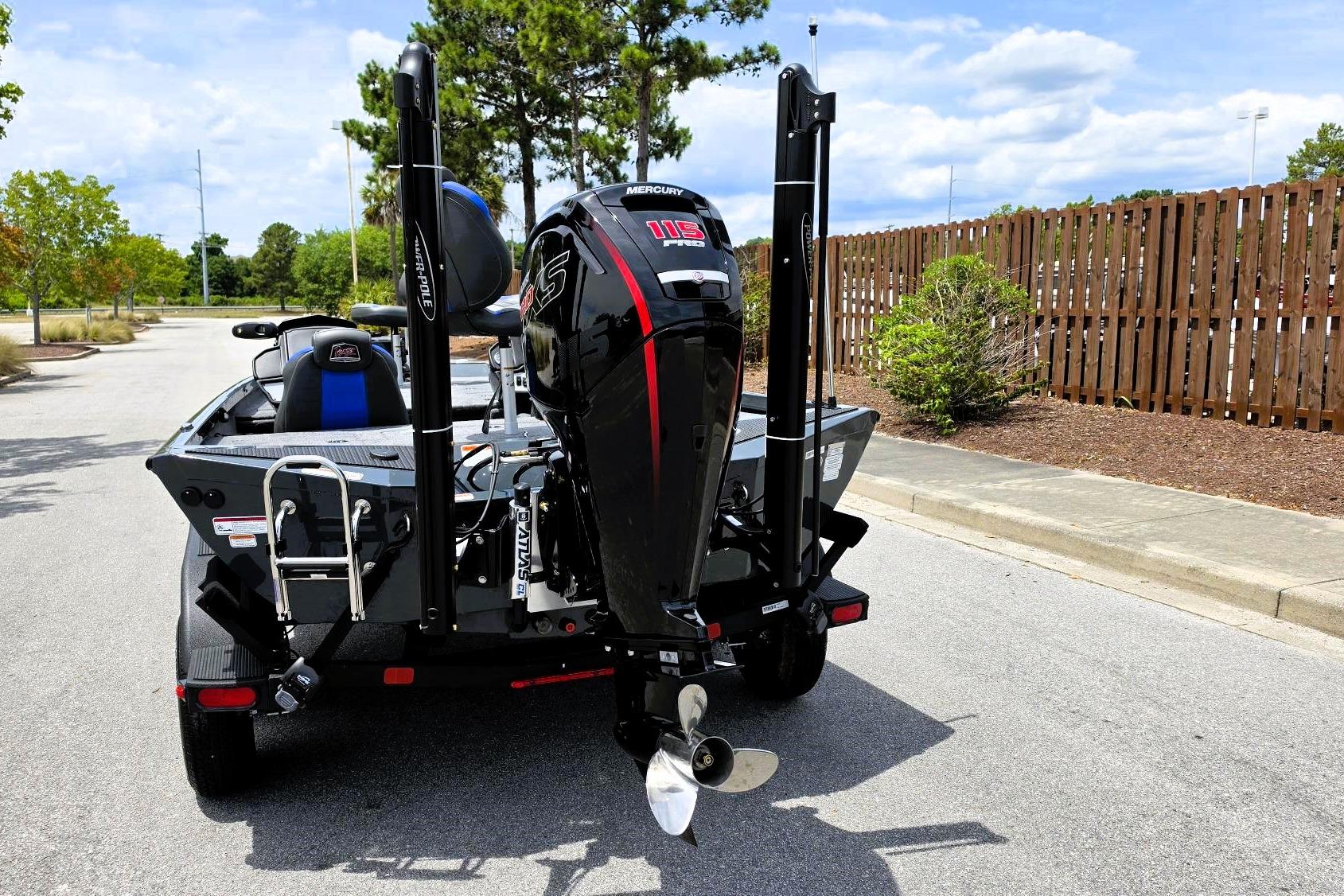 2026 Ranger RT188P boat with powerful outboard motor on a sunny day.