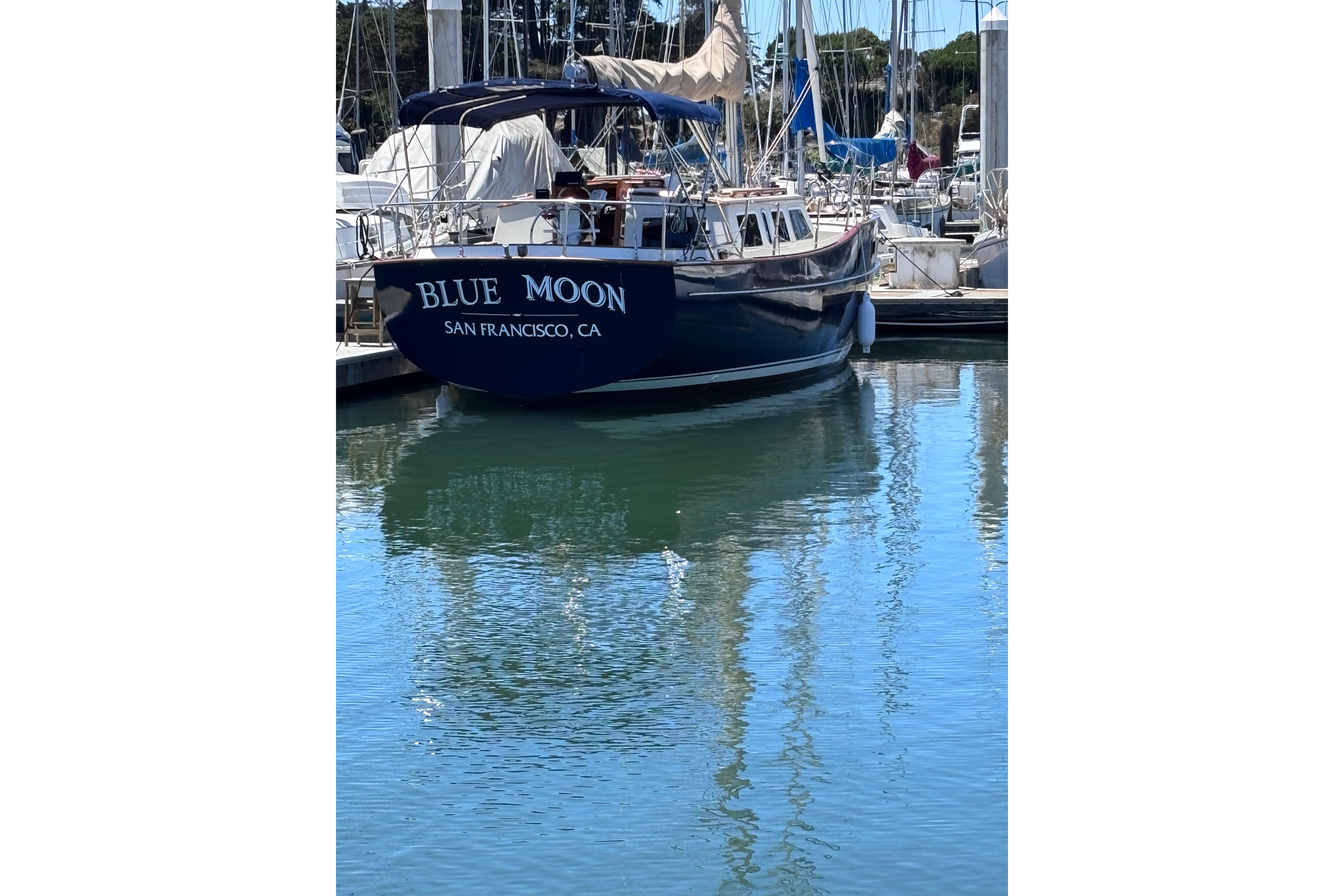 Sailboat "Blue Moon" docked in marina, Swift 33 model, 1978, San Francisco, CA.