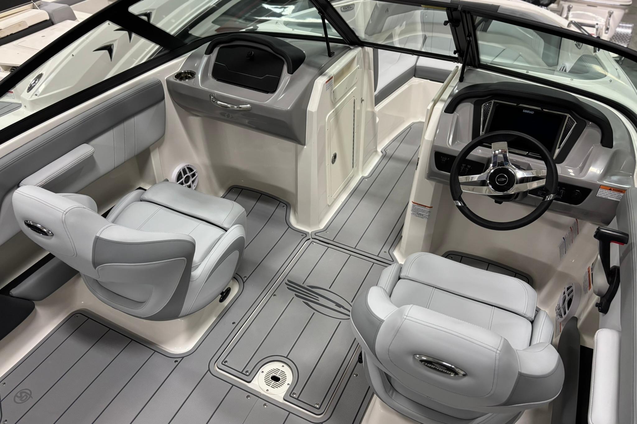 2026 Chaparral 21 SSi OB boat interior with modern helm and seating.