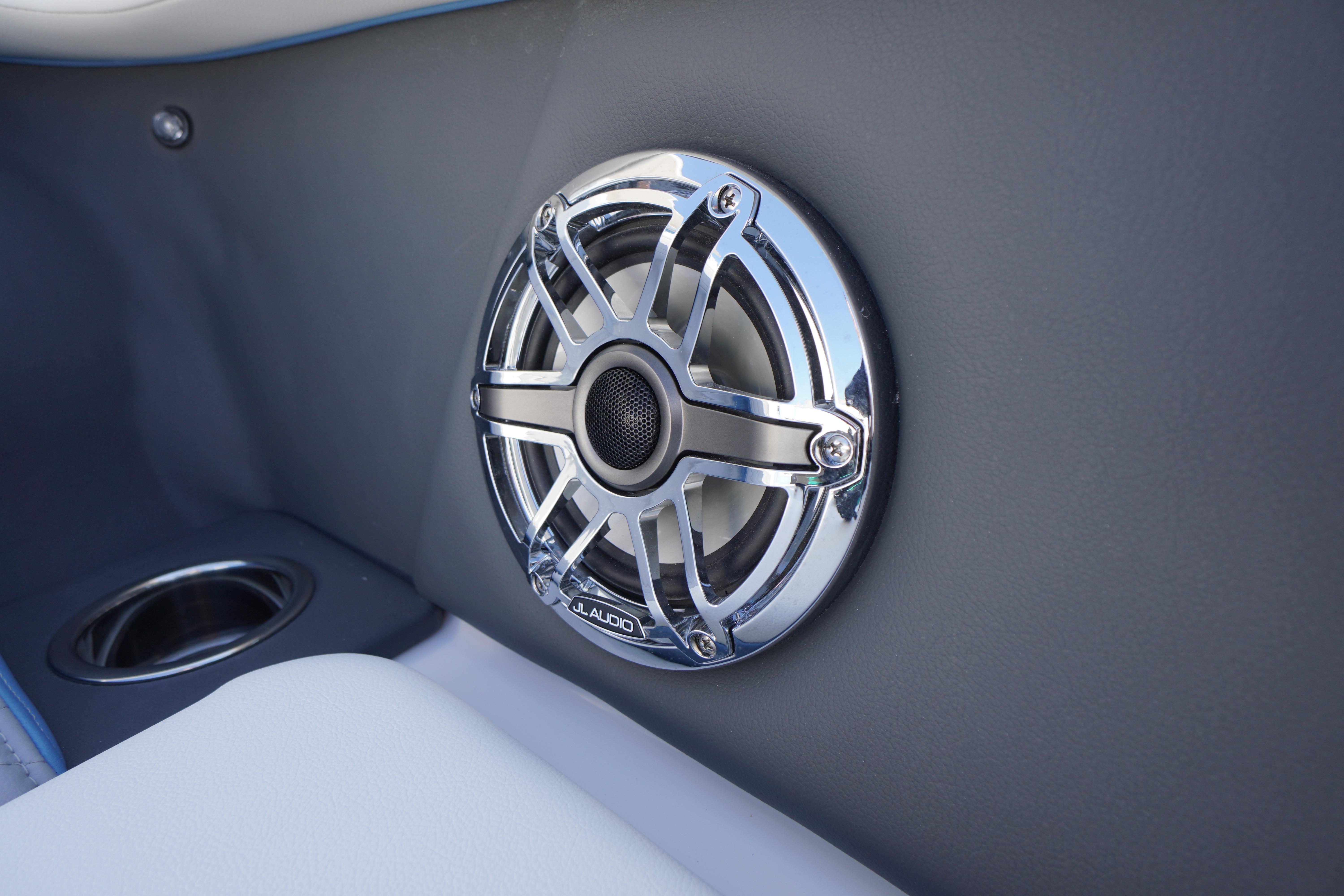 Chrome speaker detail on 2026 Chaparral 270 OSX boat interior.