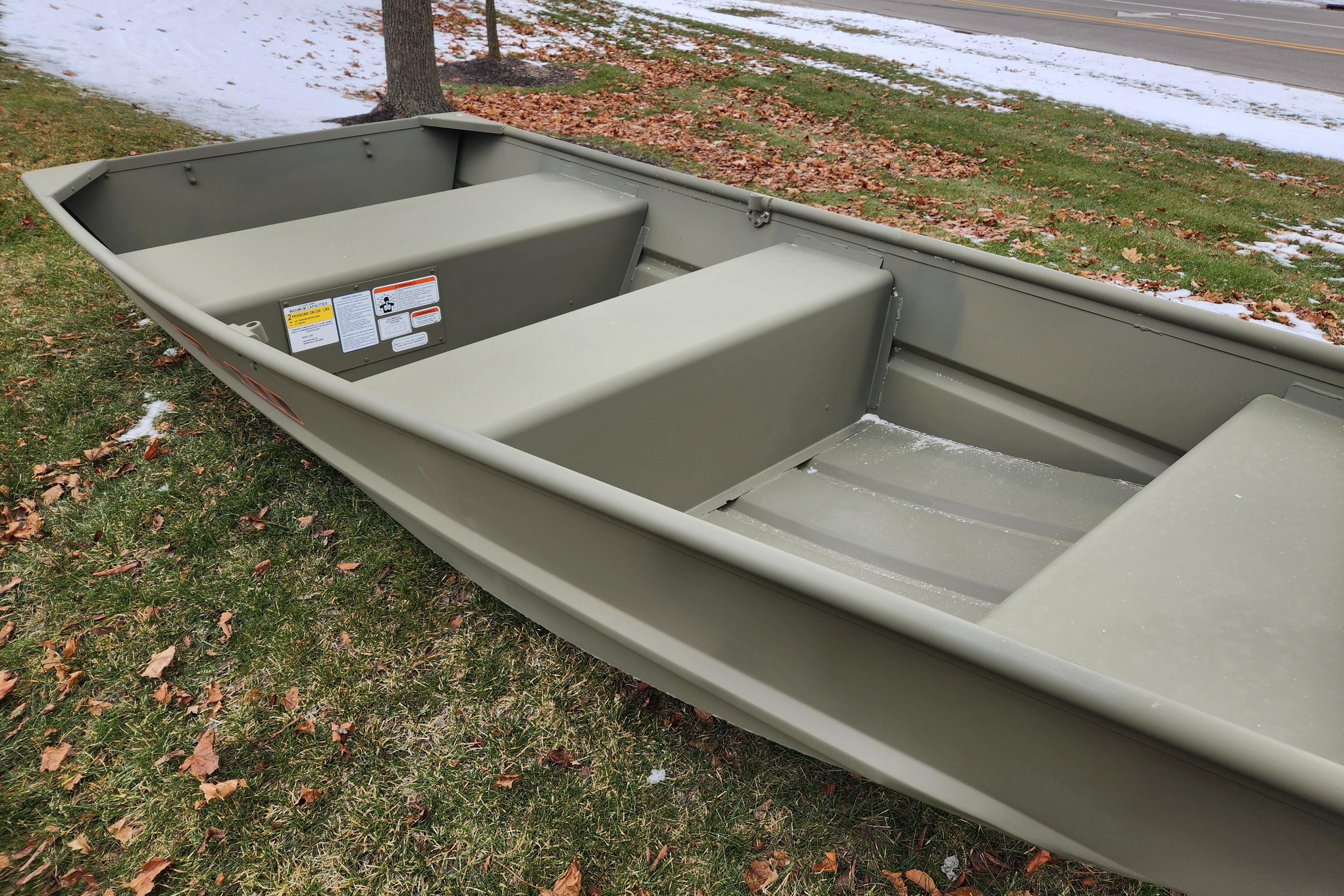 2026 Tracker Grizzly 10 Jon boat on grass with autumn leaves.