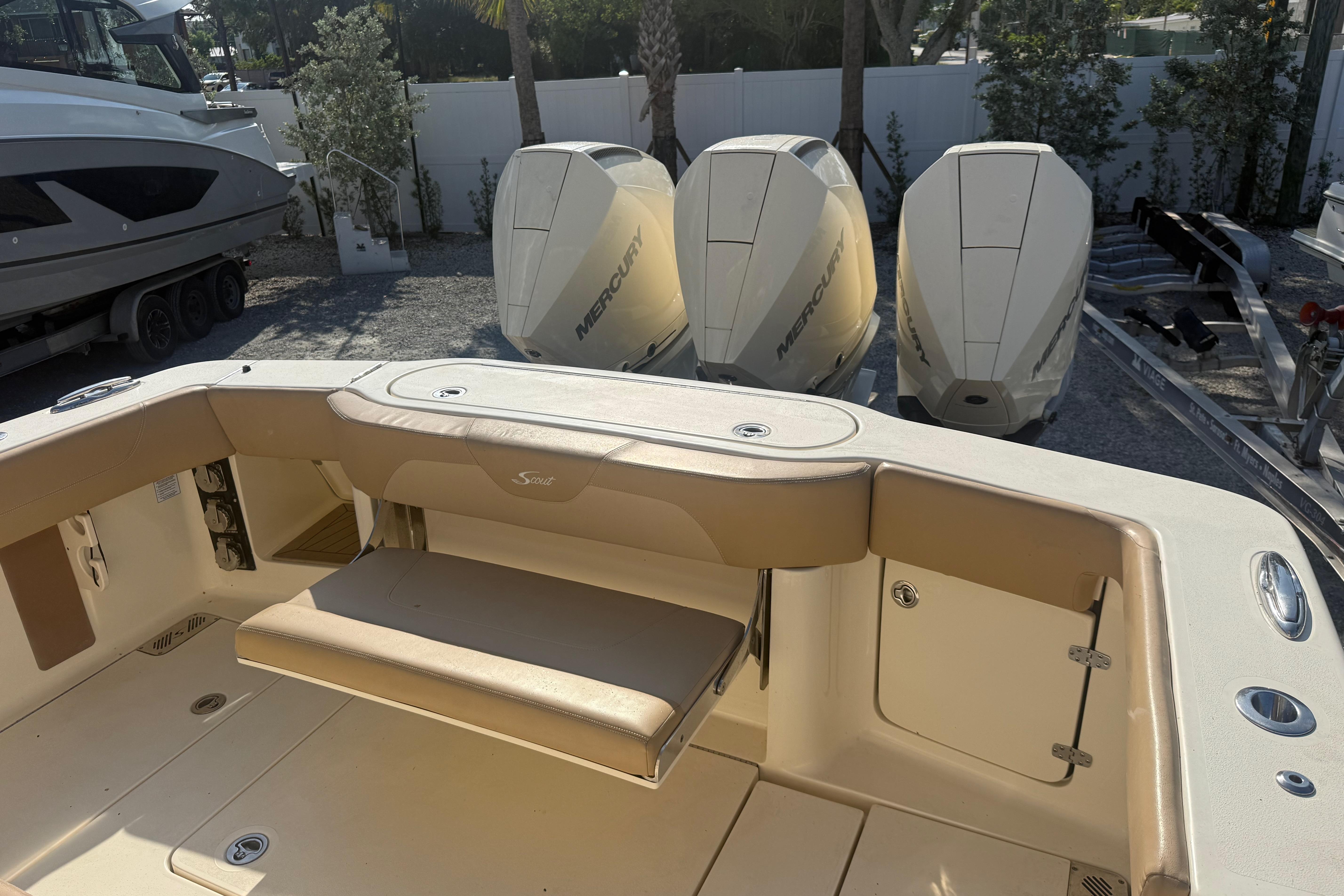 2022 Scout 355 LXF boat interior with triple Mercury outboard engines.