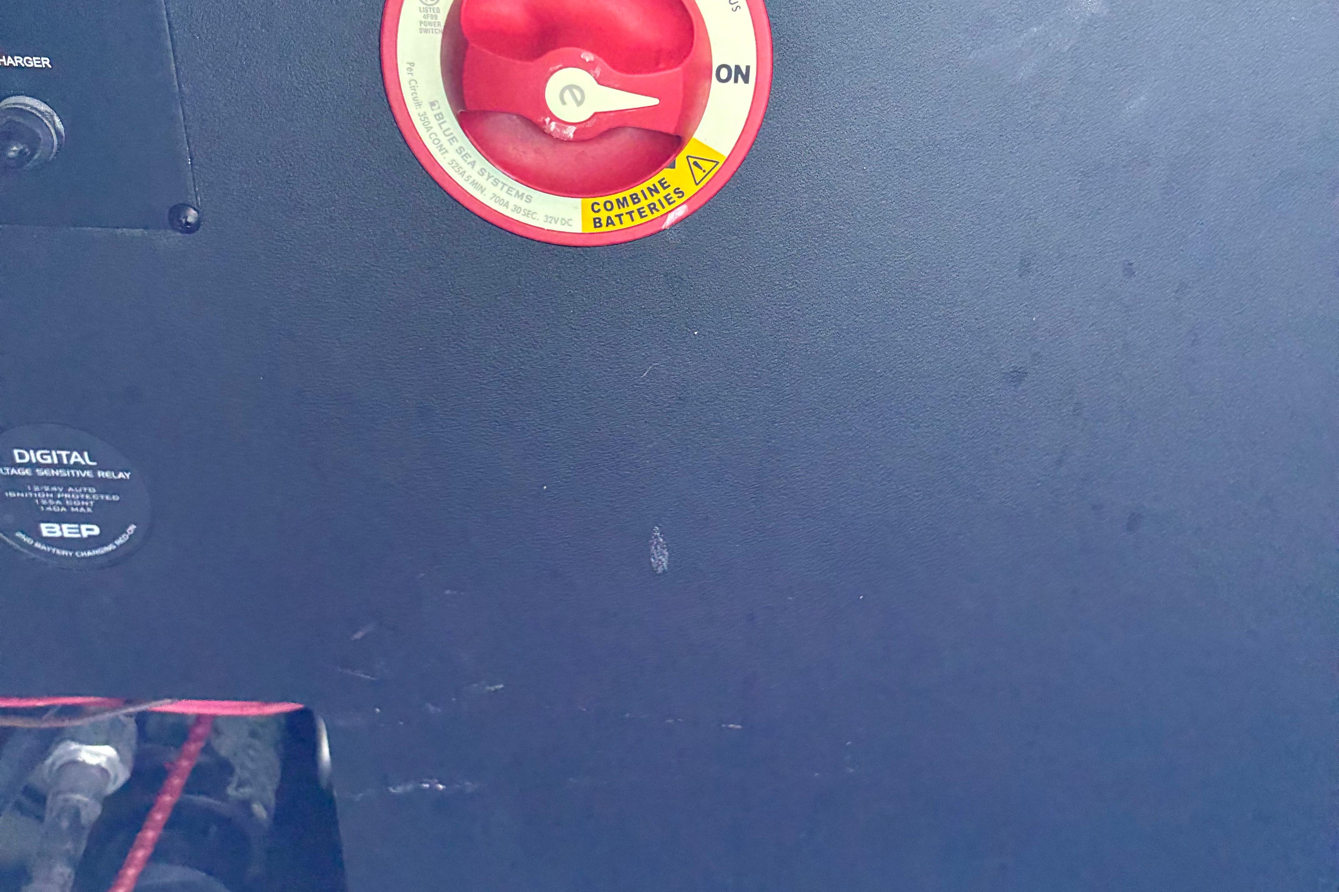 Control panel of a 2025 Regal LS2 boat with battery switch and digital relay.
