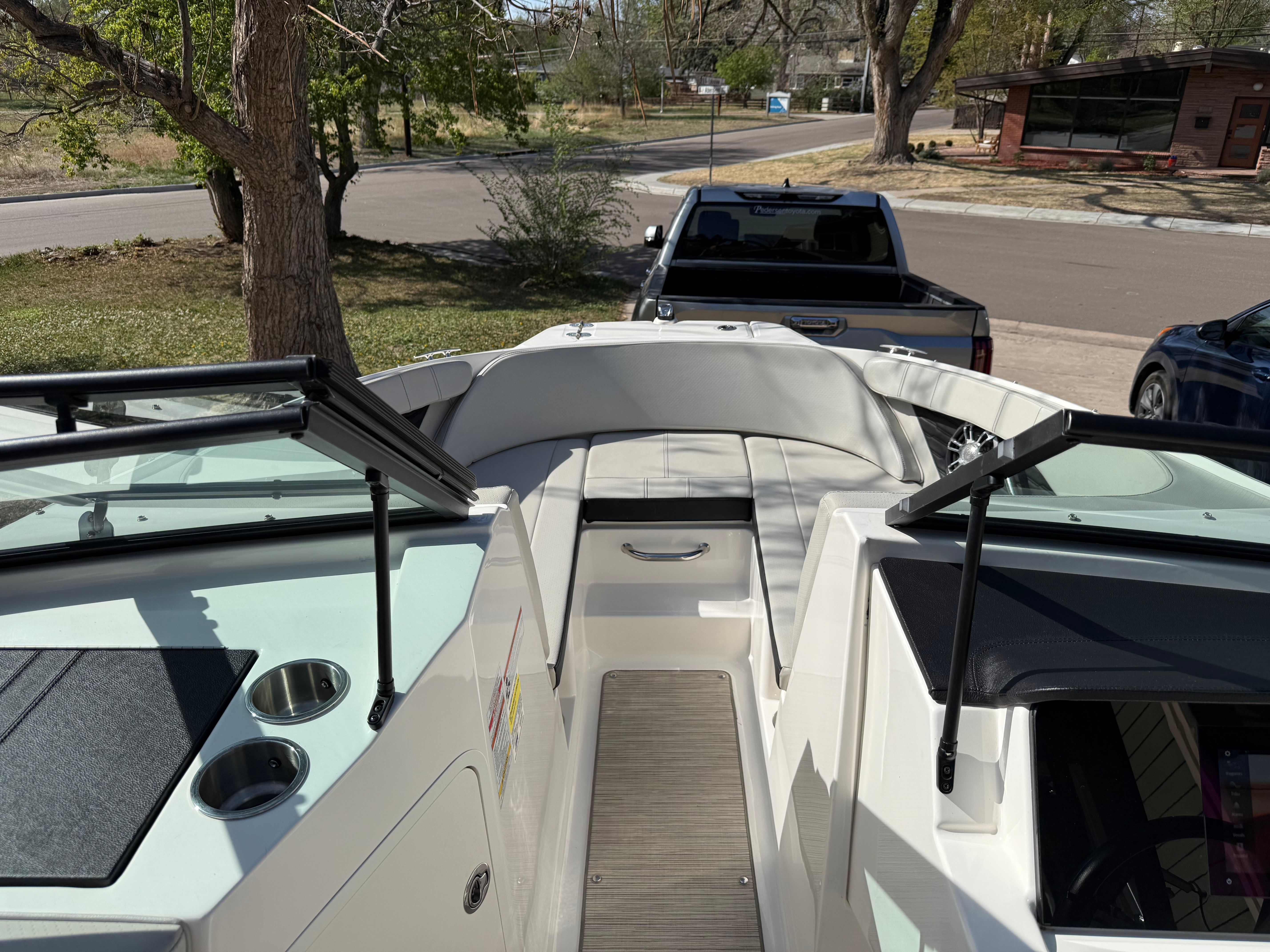 Interior view of a 2022 Sea Ray SPX 210 boat.