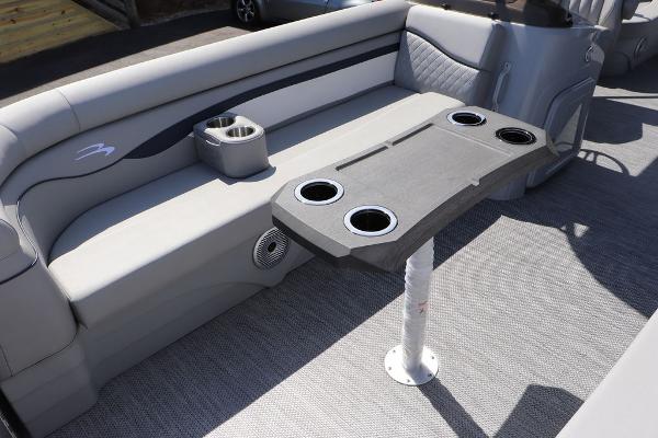 2024 Bennington 21 SSR boat interior with seating and cup holders.