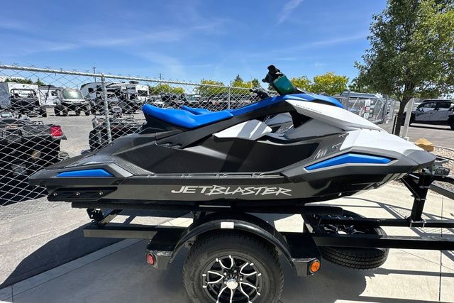 A black 2026 Yamaha WaveRunner Jetblaster sits on a trailer in an outdoor area.