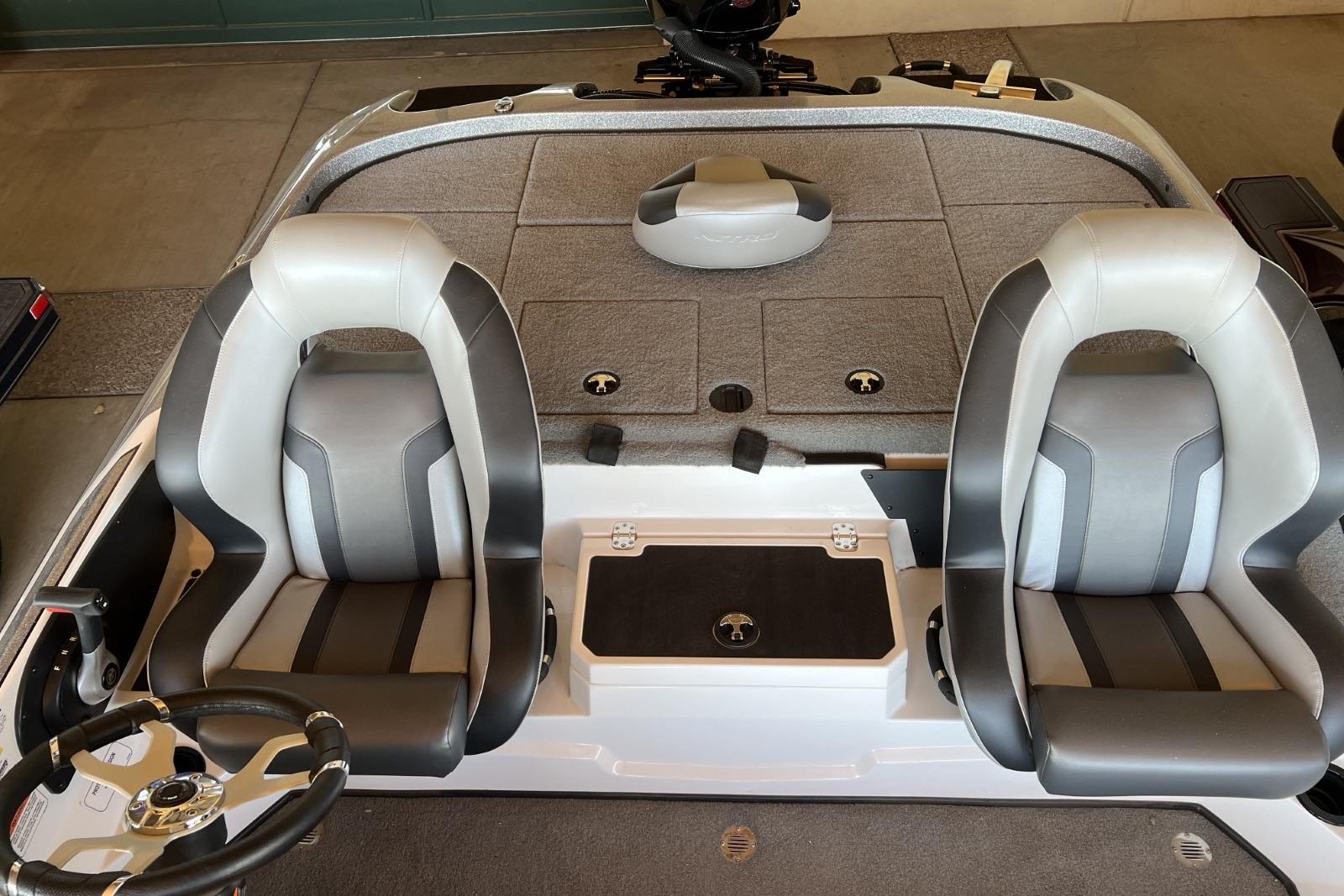 2025 Nitro Z19 boat interior with dual seats and steering wheel.