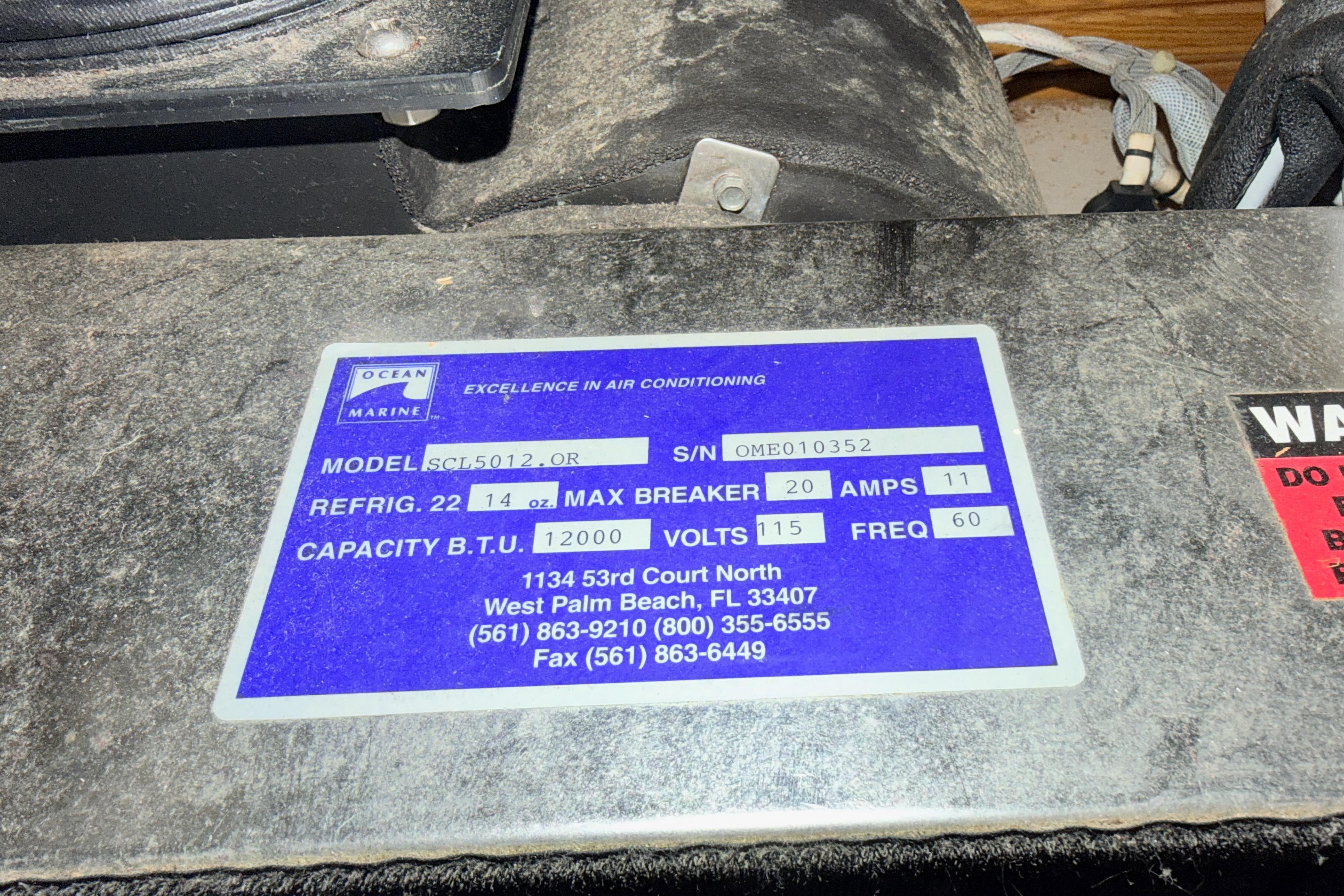 Label on Ocean Marine air conditioning unit, model SCL5012.OR, 12000 BTU, 115 volts.