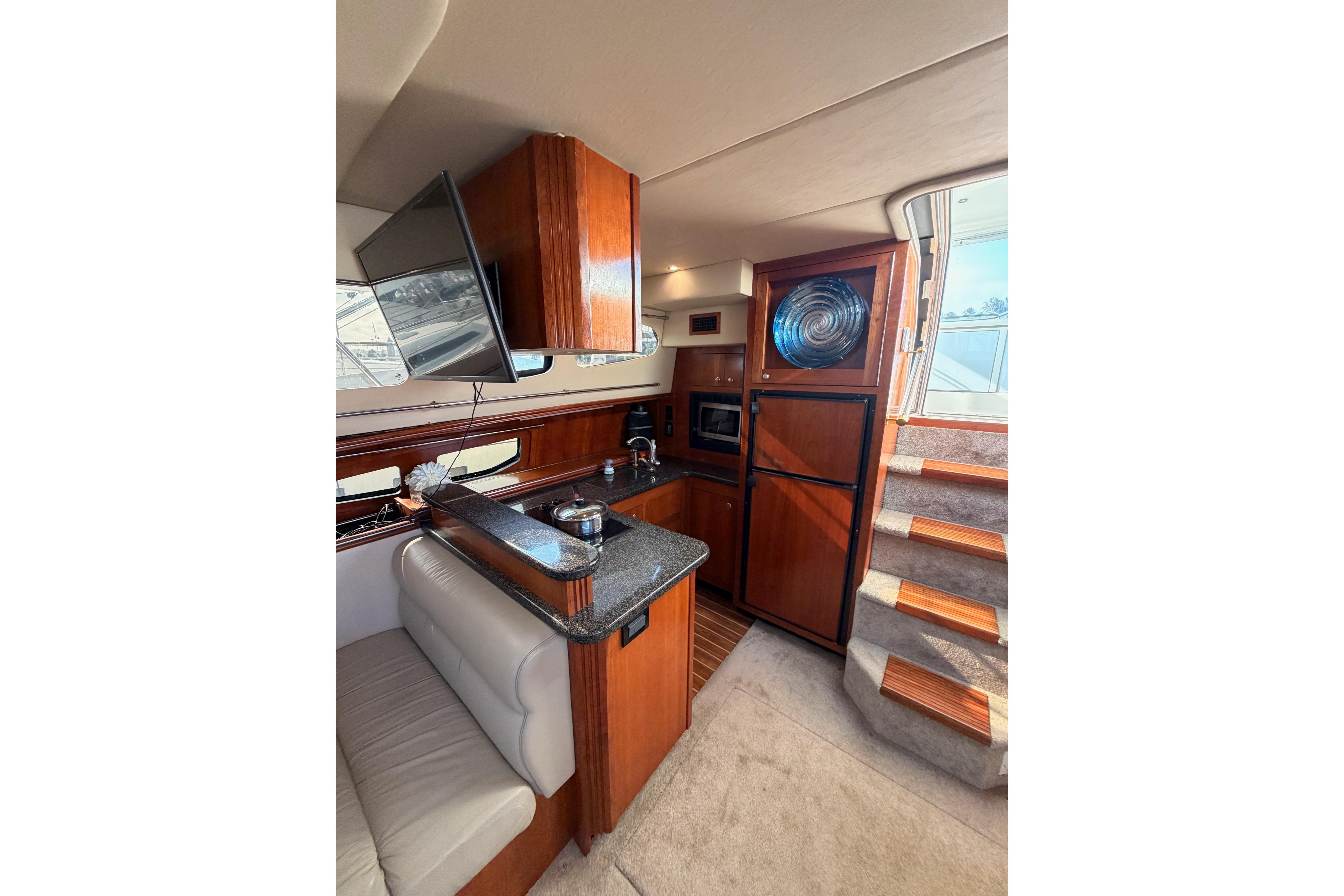 Luxurious interior of 2005 Cruisers Yachts 405 Express Motoryacht with modern amenities and elegant design.