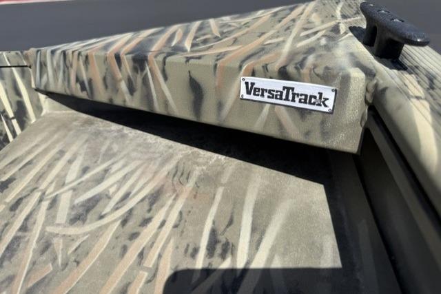2026 Tracker Grizzly 1860 Utility boat with camo pattern and VersaTrack system.