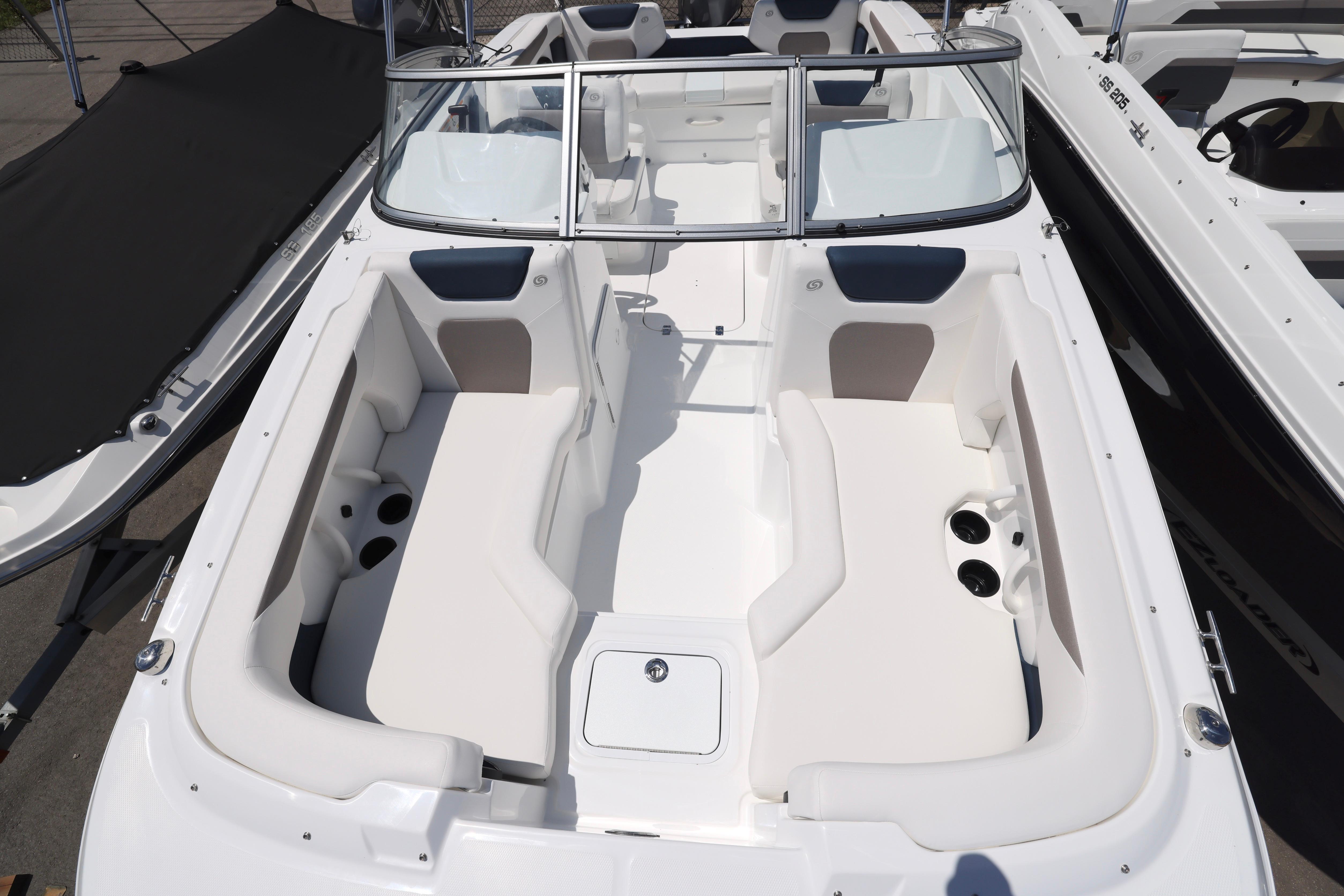 2026 Hurricane SunDeck 2050 OB boat interior with spacious seating and cup holders.