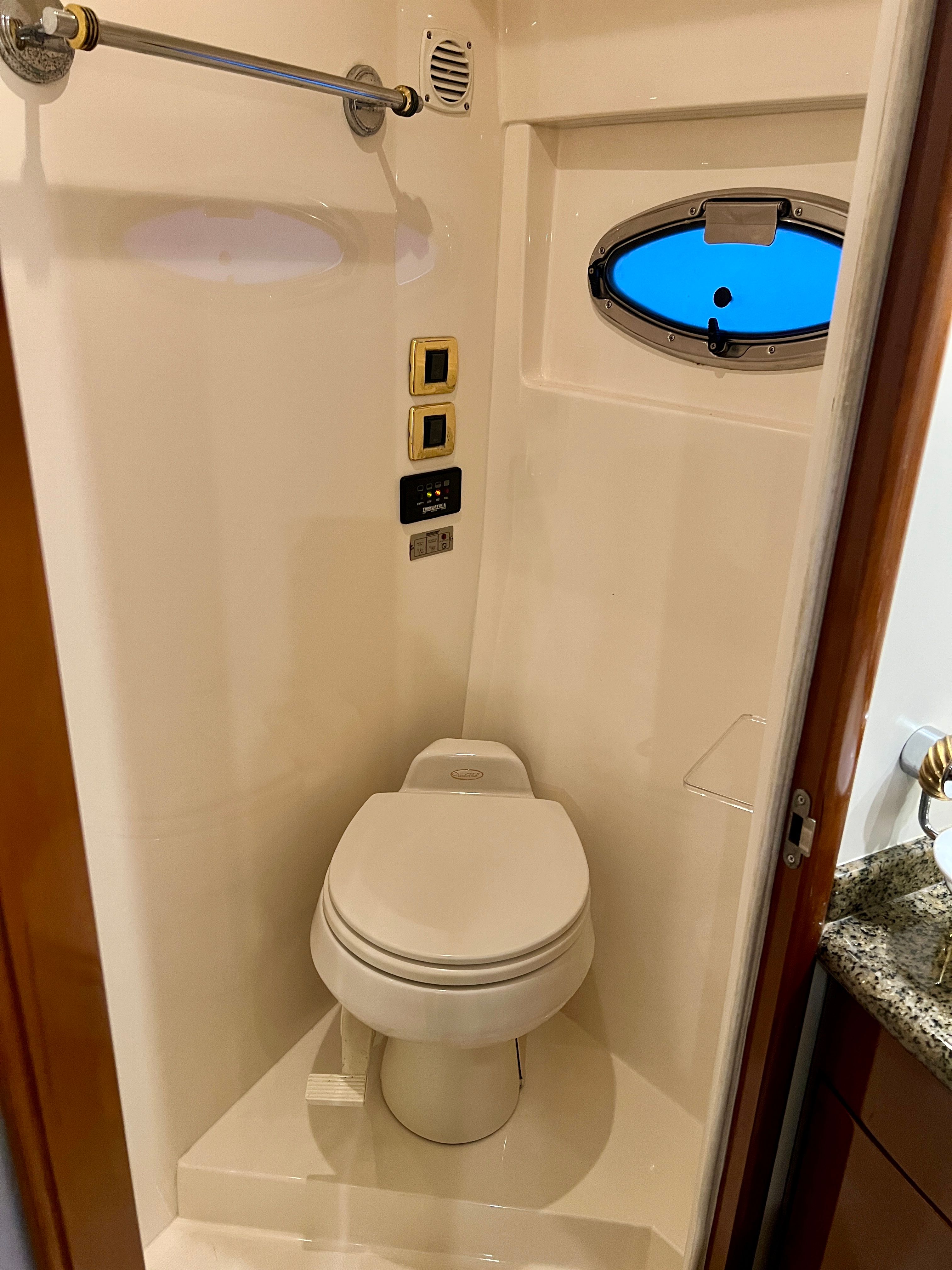 Toilet in 2005 Carver 560 Voyager Sky yacht.