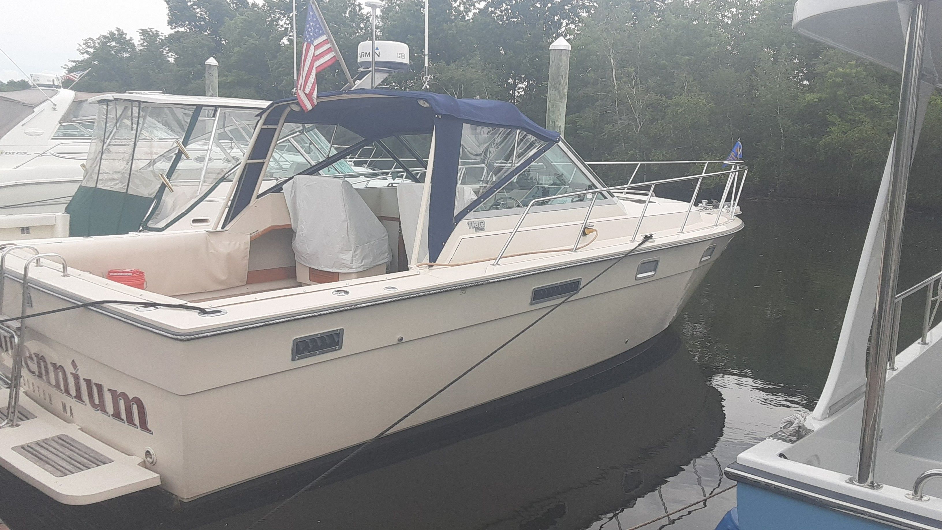 1985 Tiara Yachts 3100 Open on water, side view.