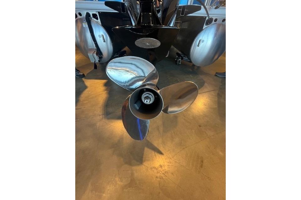 2026 Sun Tracker Fishin' Barge 20 DLX boat propeller, shiny metal finish.