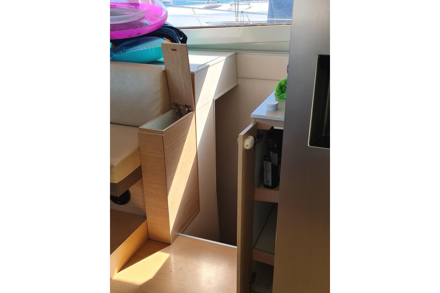 Interior of 2016 Bali 4.5 yacht with open storage compartments.