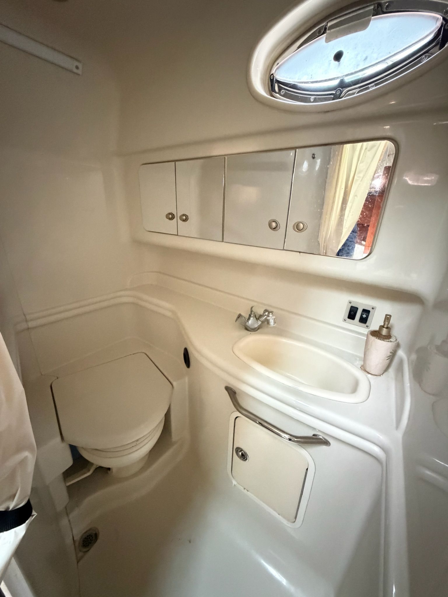 Interior of 2007 Sea Ray 340 Sundancer bathroom.