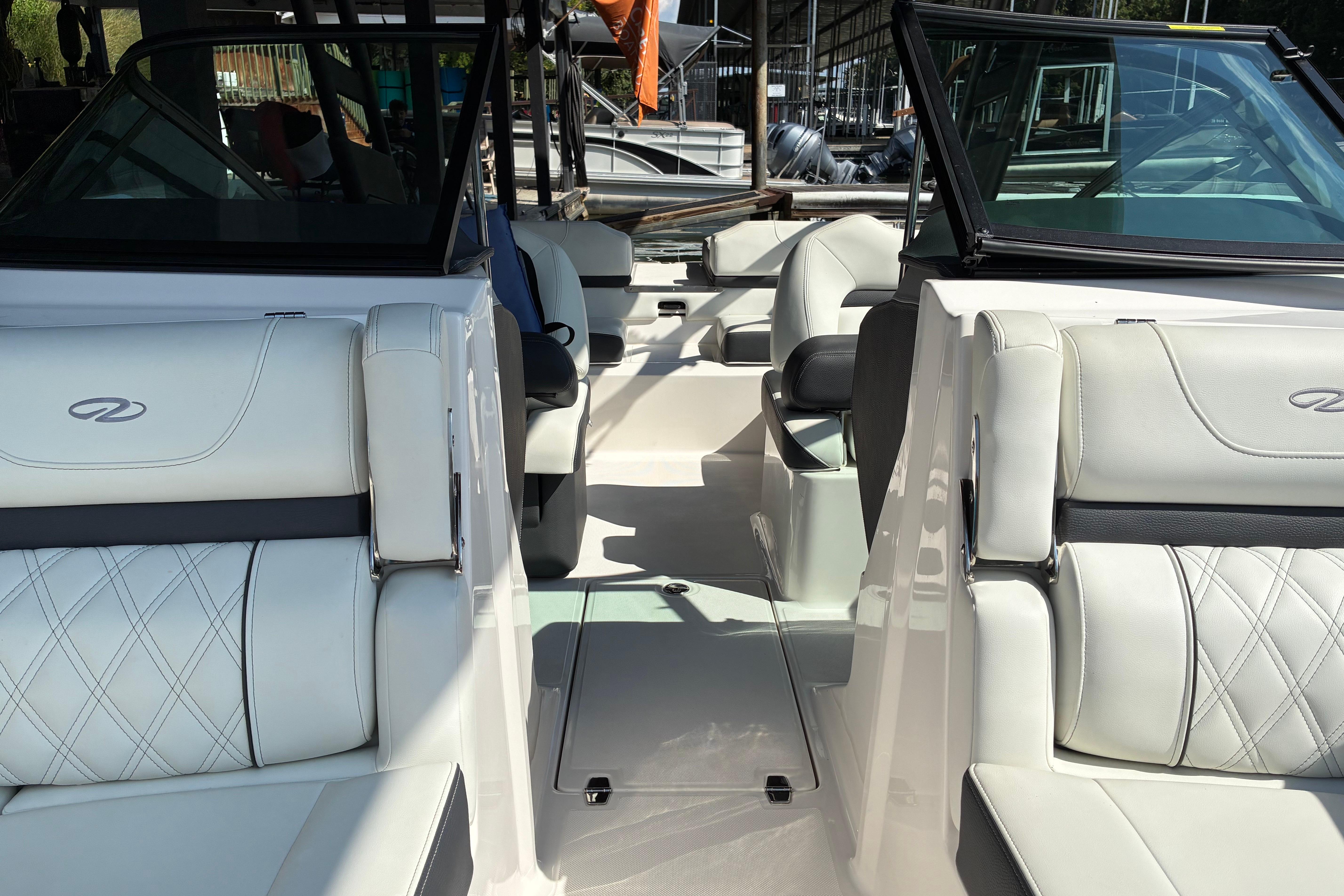 2025 Regal LS2 boat interior with luxurious white seating and modern design.