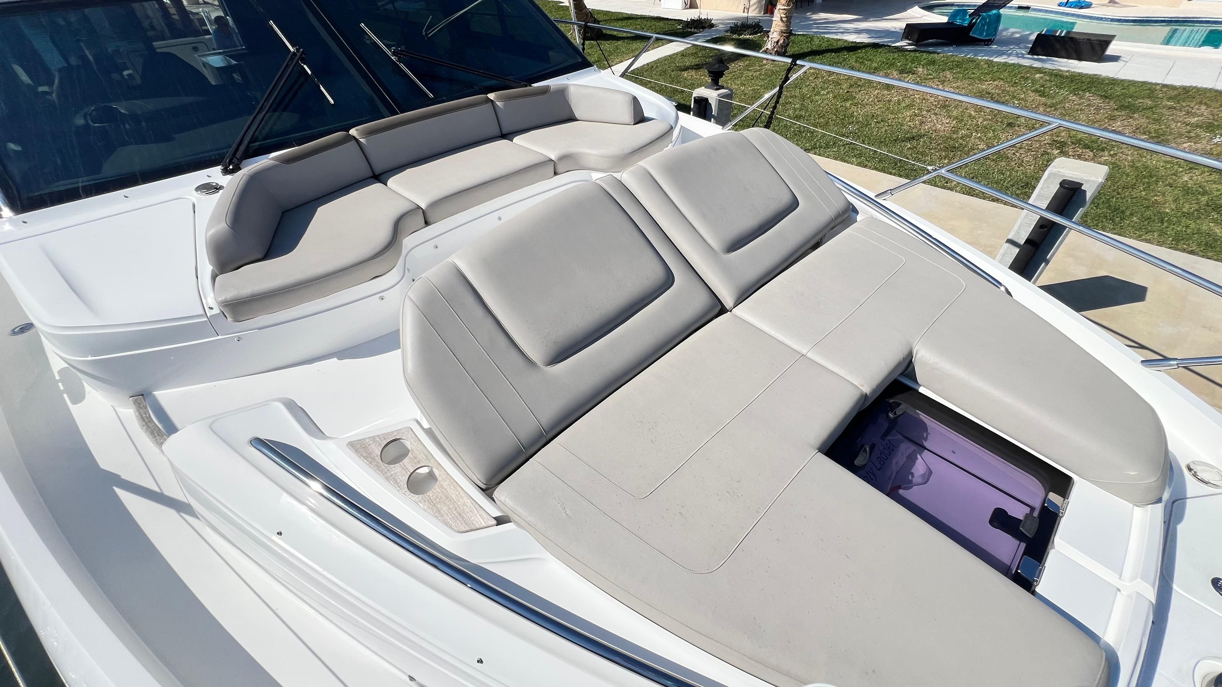 Luxurious 2019 Princess F62 yacht with spacious sunbathing area and comfortable seating.