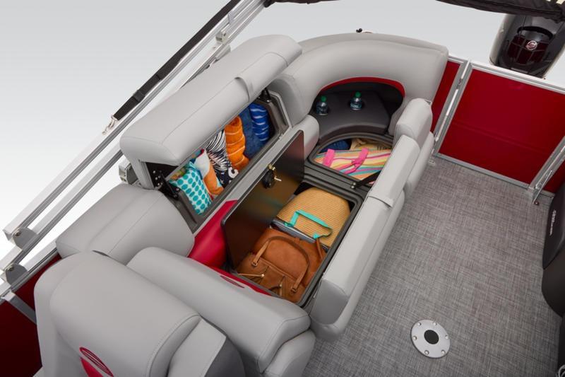 2026 Sun Tracker Party Barge 22 DLX interior storage with organized compartments and seating.