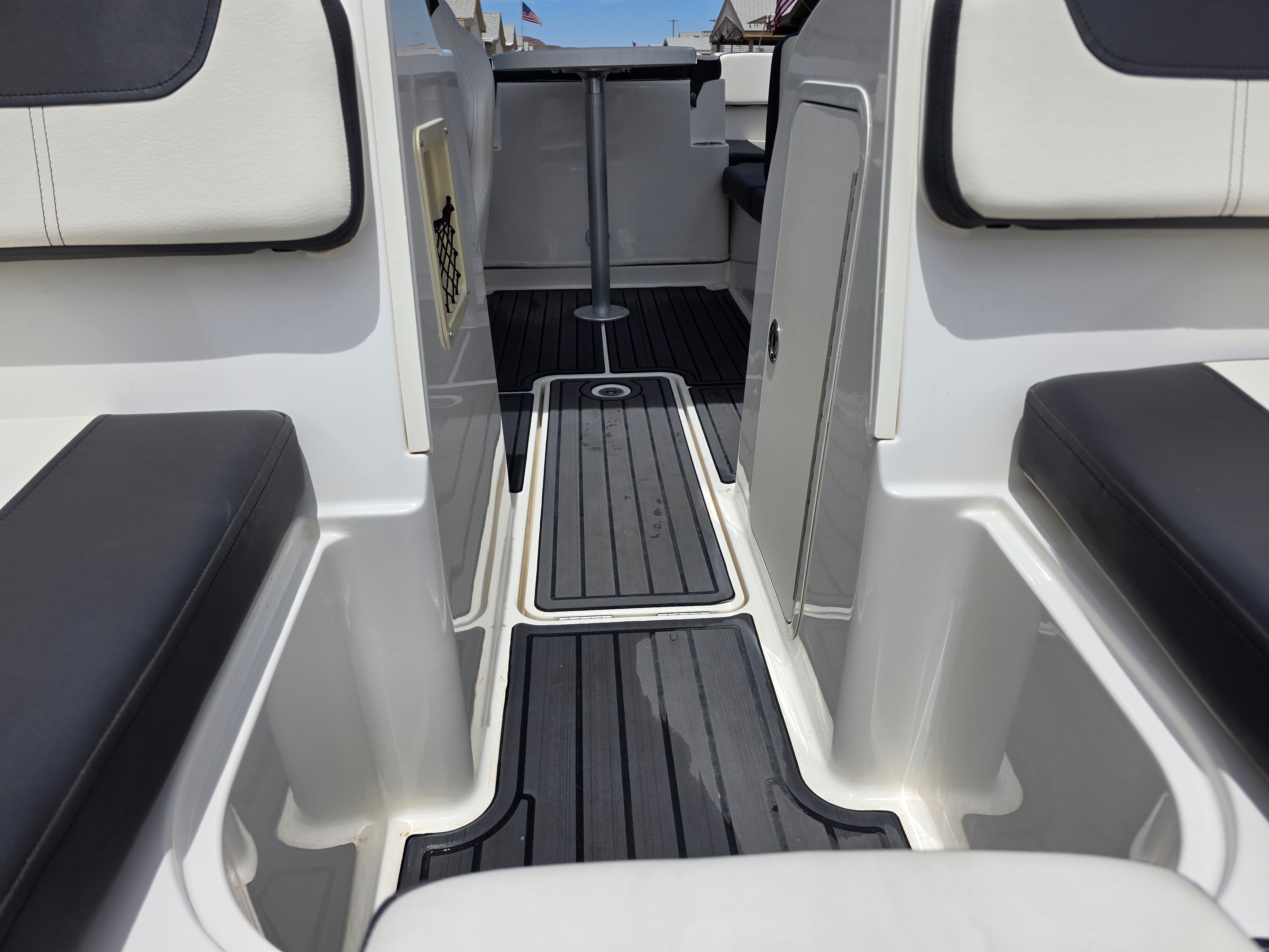 Interior of a 2021 Bayliner VR4 Bowrider I/O with black and white seating.