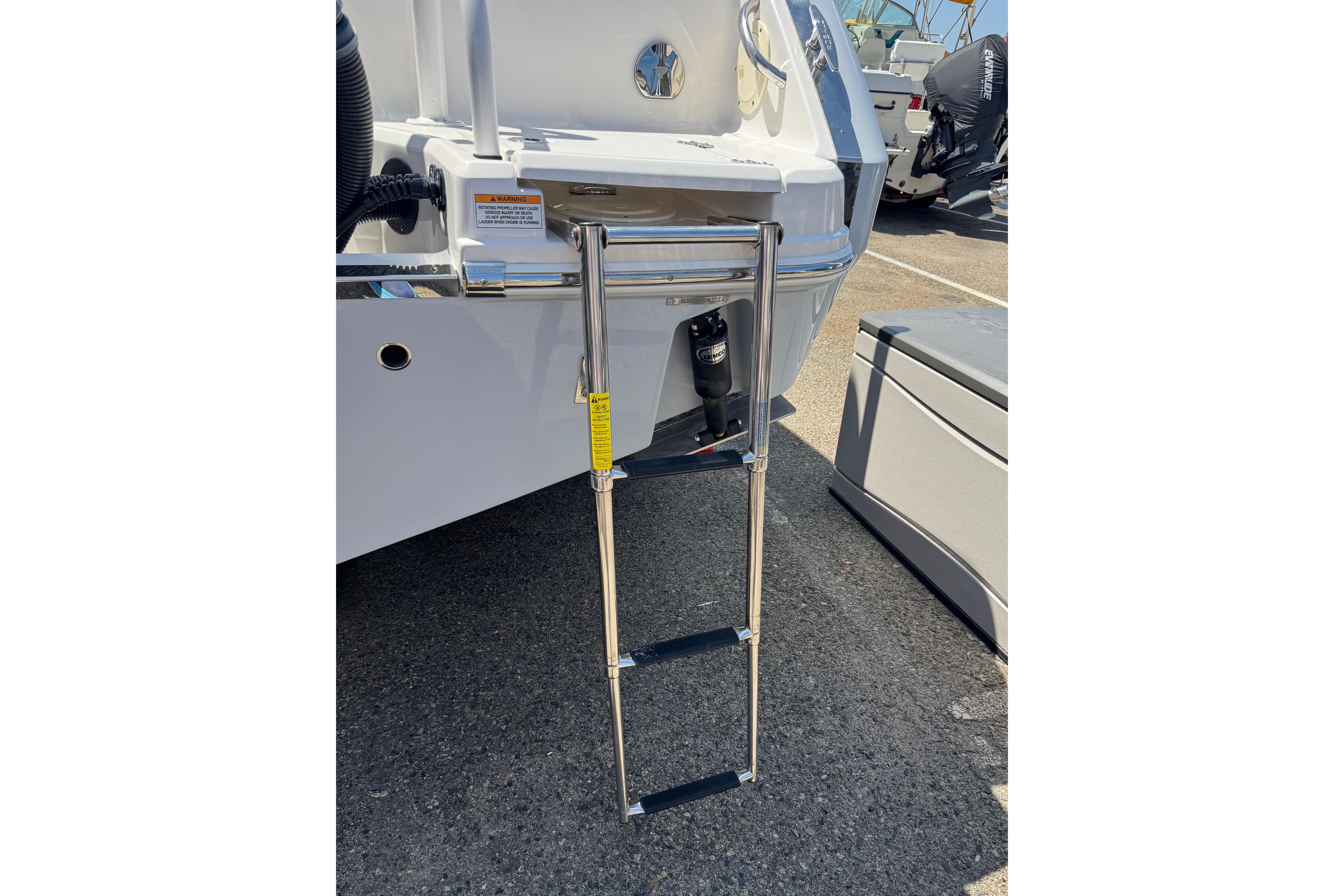 2022 Robalo R230 Center Console boat with stainless steel swim ladder.